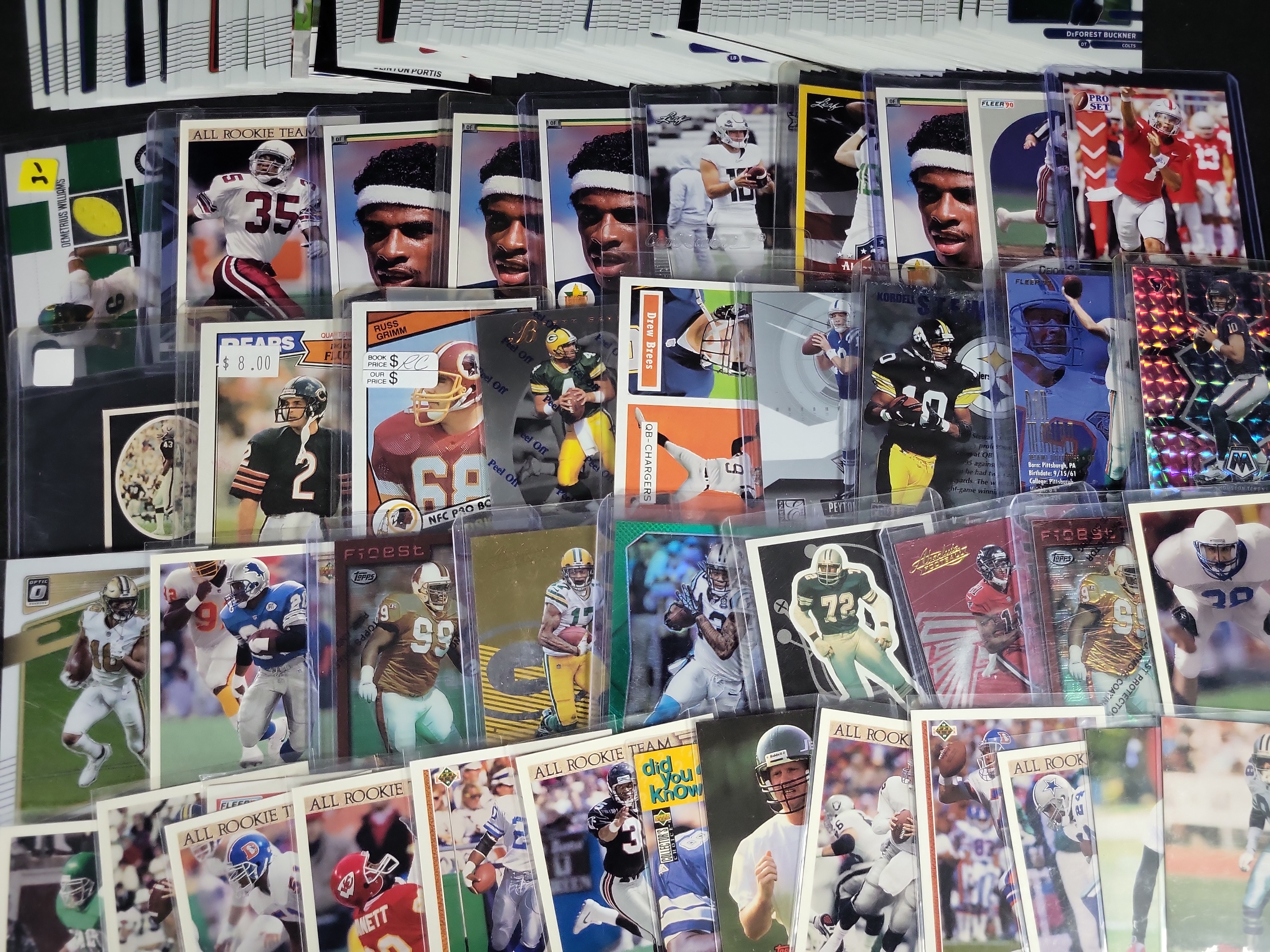 I03842 | A Large Collection of Multi-Era NFL Football Trading Cards Including Panini Upper Deck and Topps