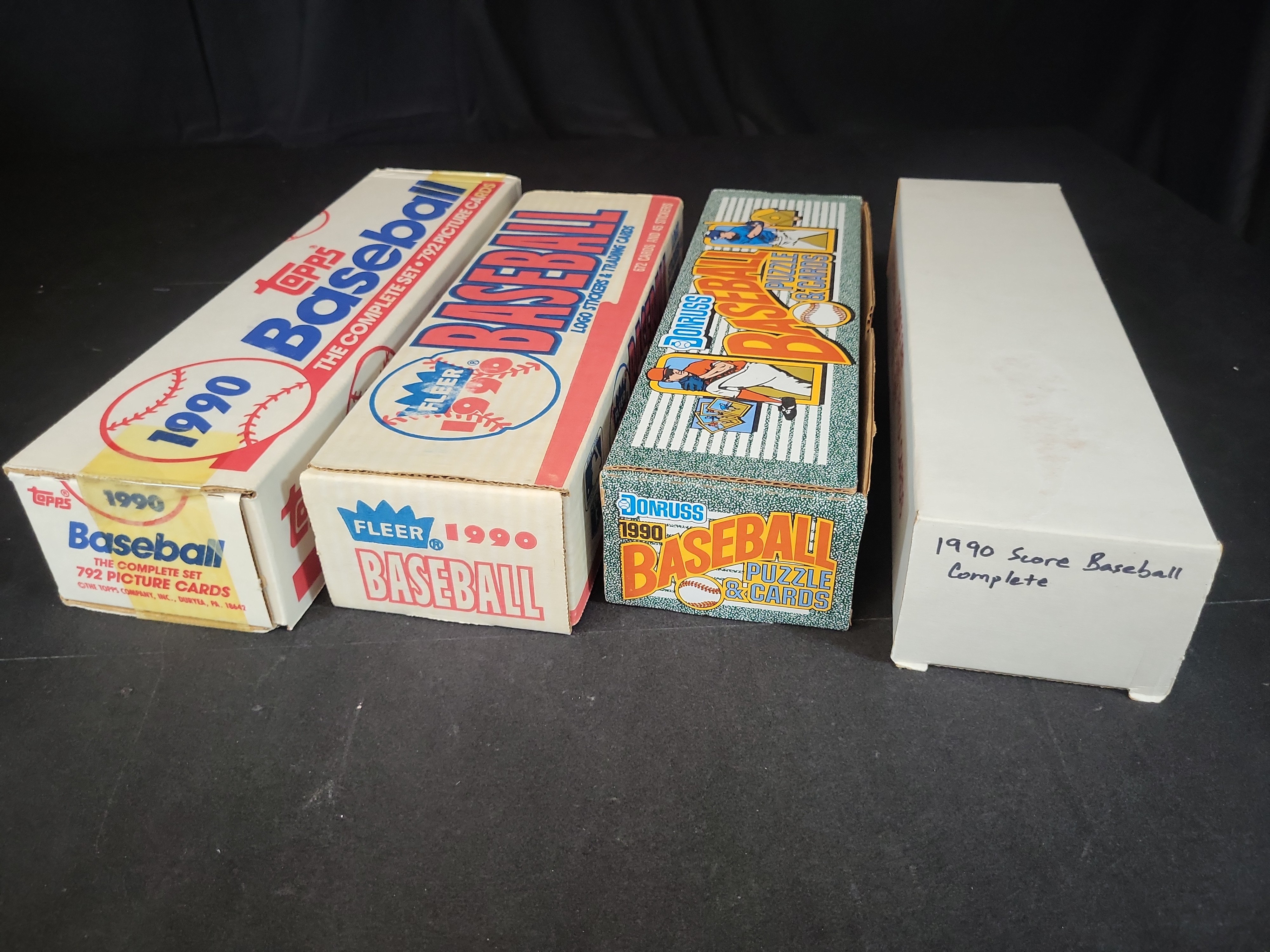 I03264 | Collection of (4) 1990 Major League Baseball Complete Factory Sets - Topps, Fleer, Donruss and Score