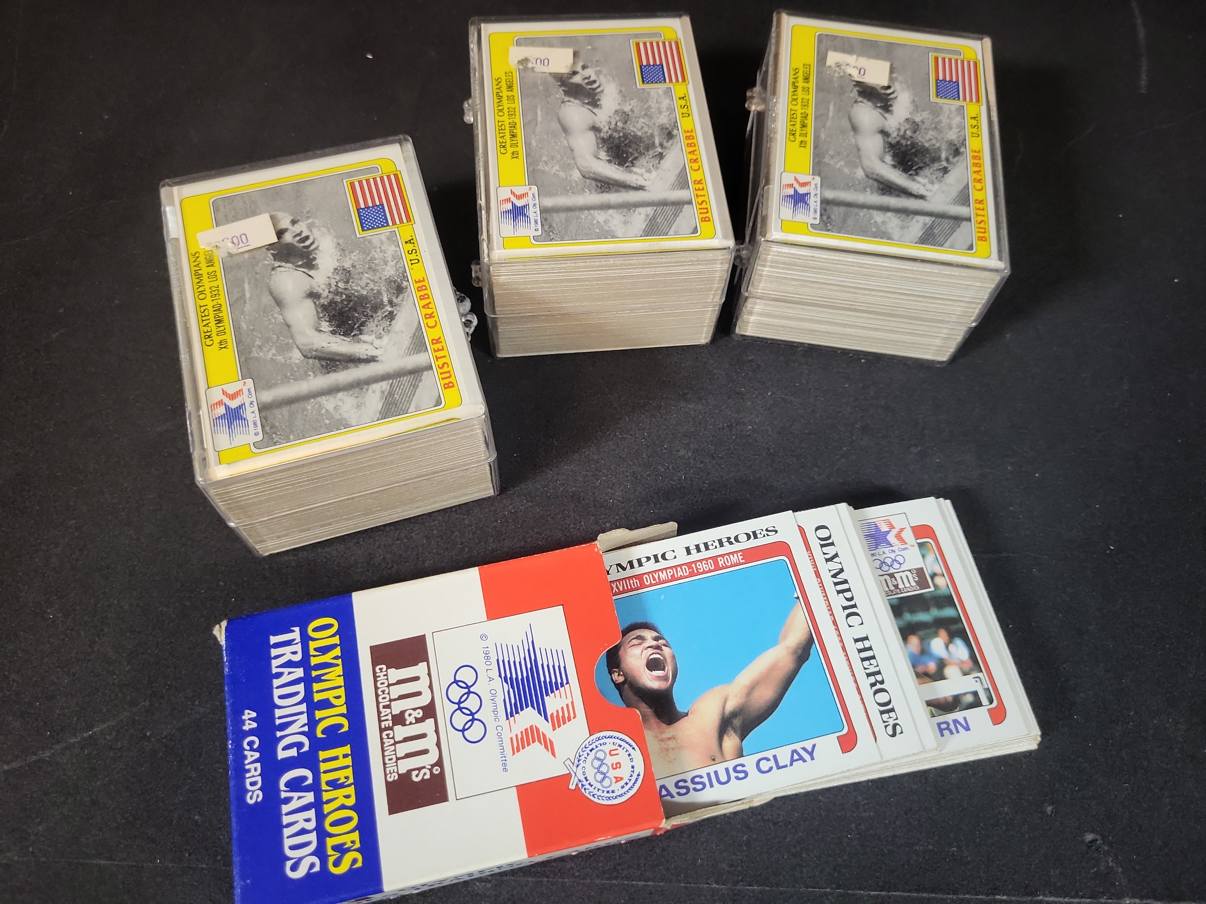 I03249 | A Group of 1983-1984 M&M's Olympic Trading Card Sets and Original Box Including Cassius Clay