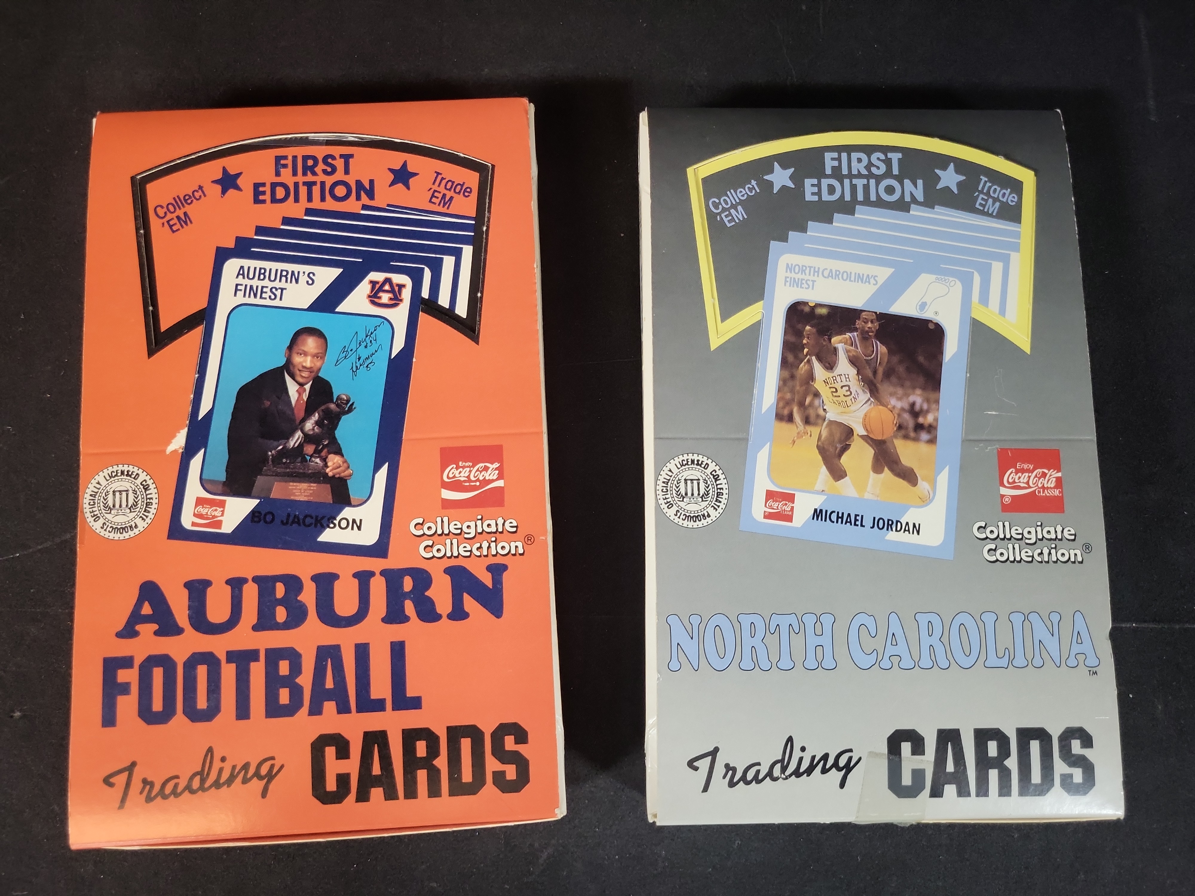 I03229 | Two Collegiate Collection First Edition Trading Card Boxes, Auburn Football and North Carolina Basketball