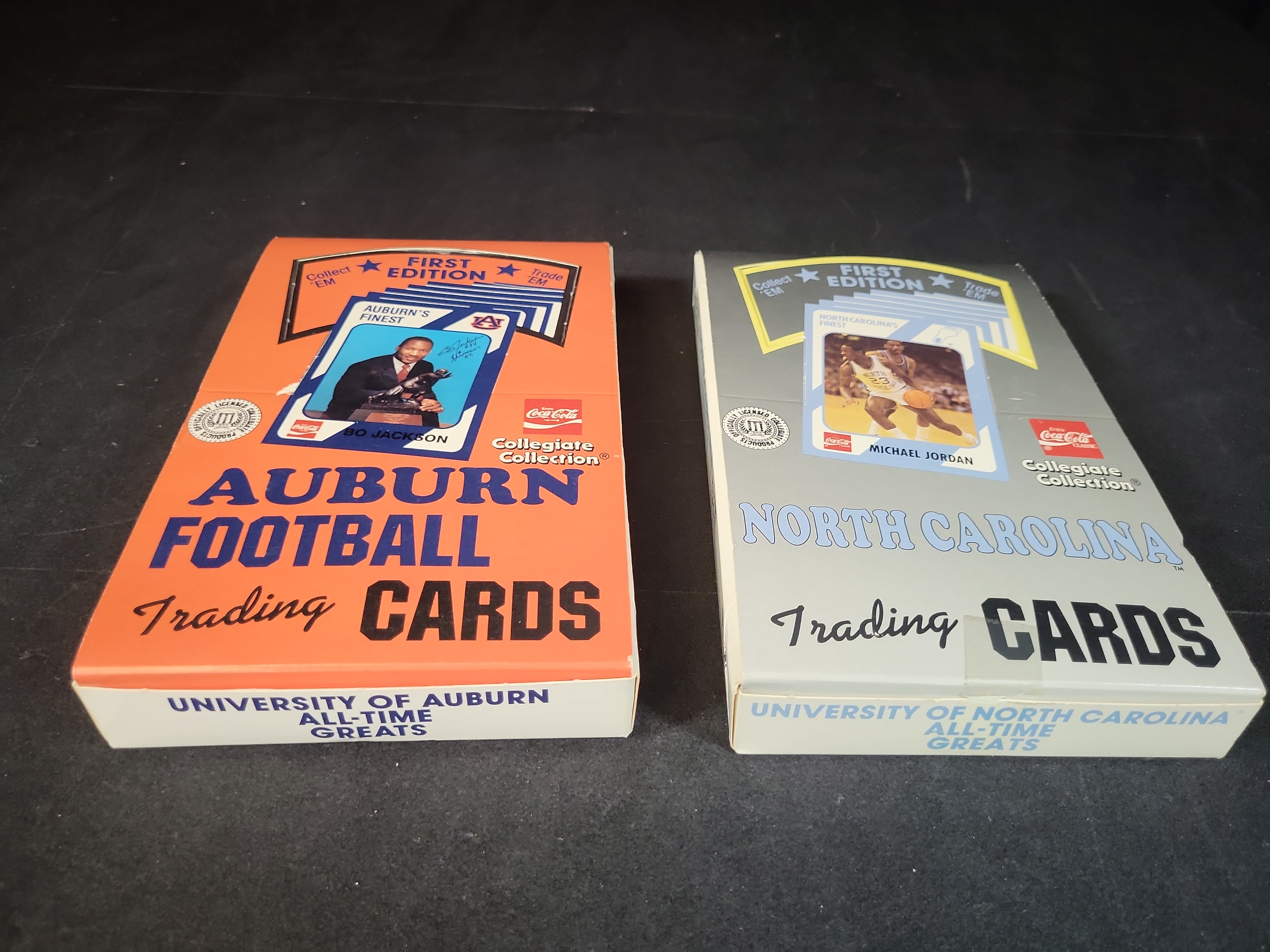 I03229 | Two Collegiate Collection First Edition Trading Card Boxes, Auburn Football and North Carolina Basketball