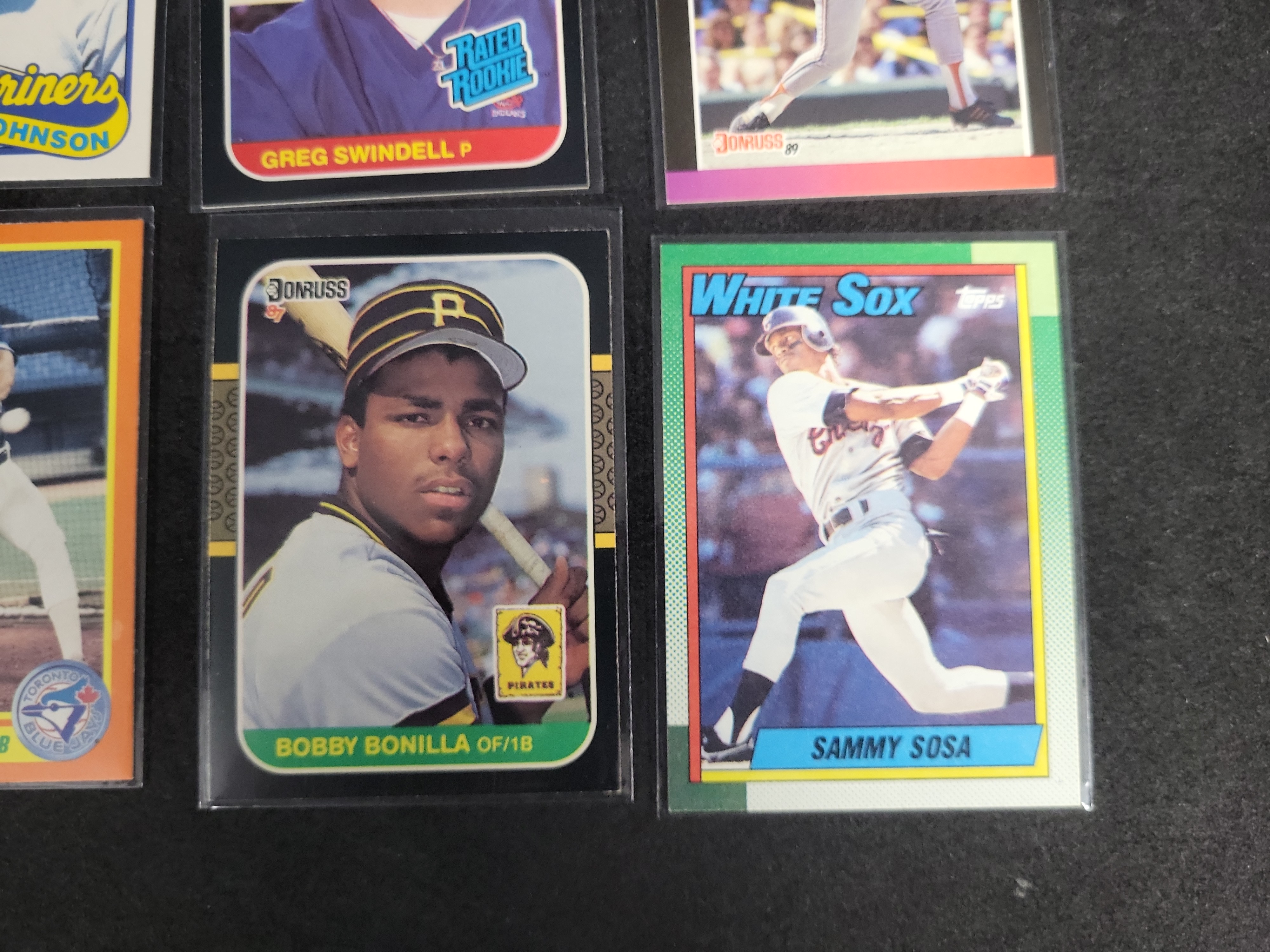 I03164 | A Collection of 12 Vintage Baseball and Crossover Trading Cards Including Rookies and Hall of Famers 1983-1990