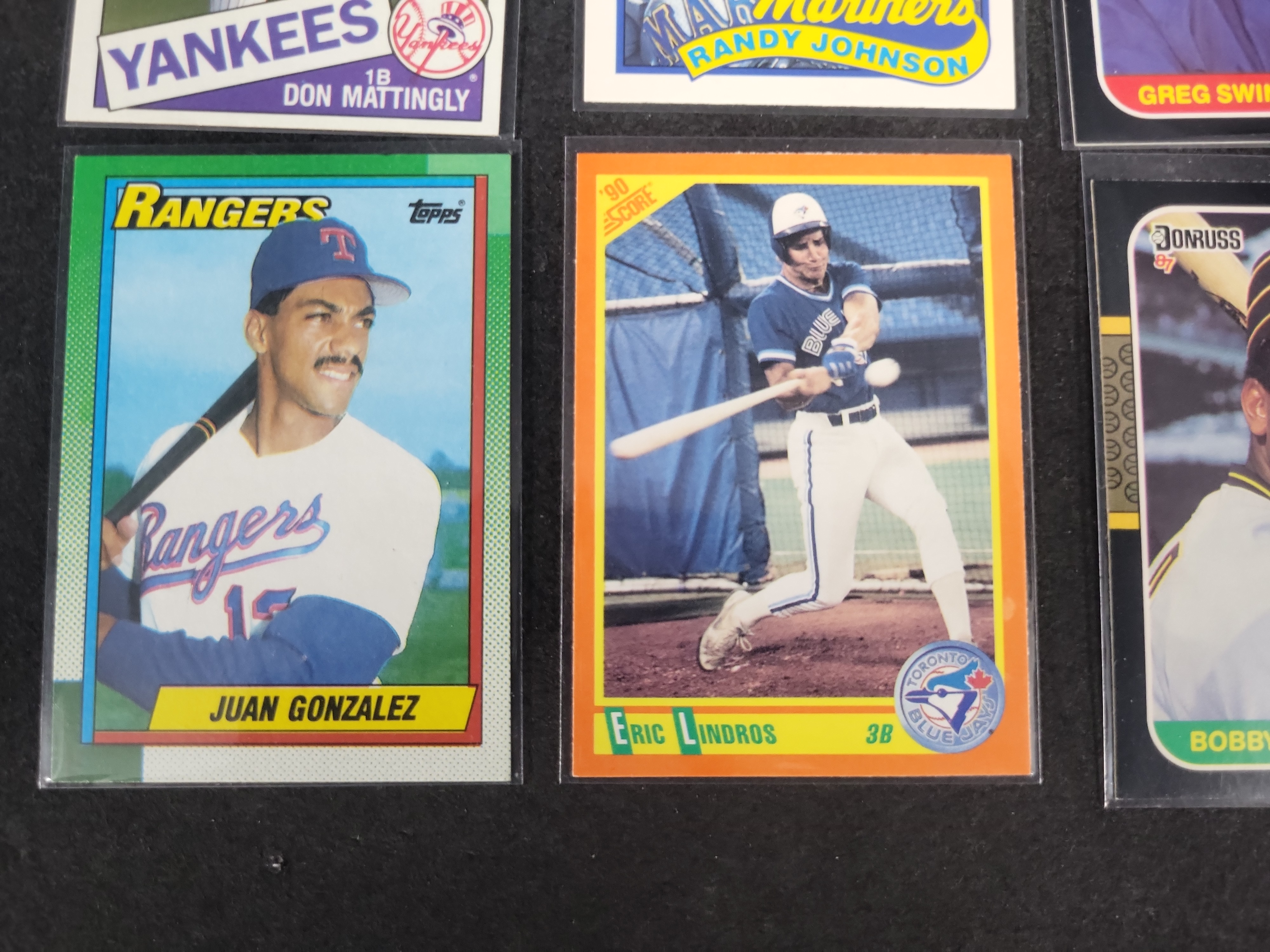 I03164 | A Collection of 12 Vintage Baseball and Crossover Trading Cards Including Rookies and Hall of Famers 1983-1990