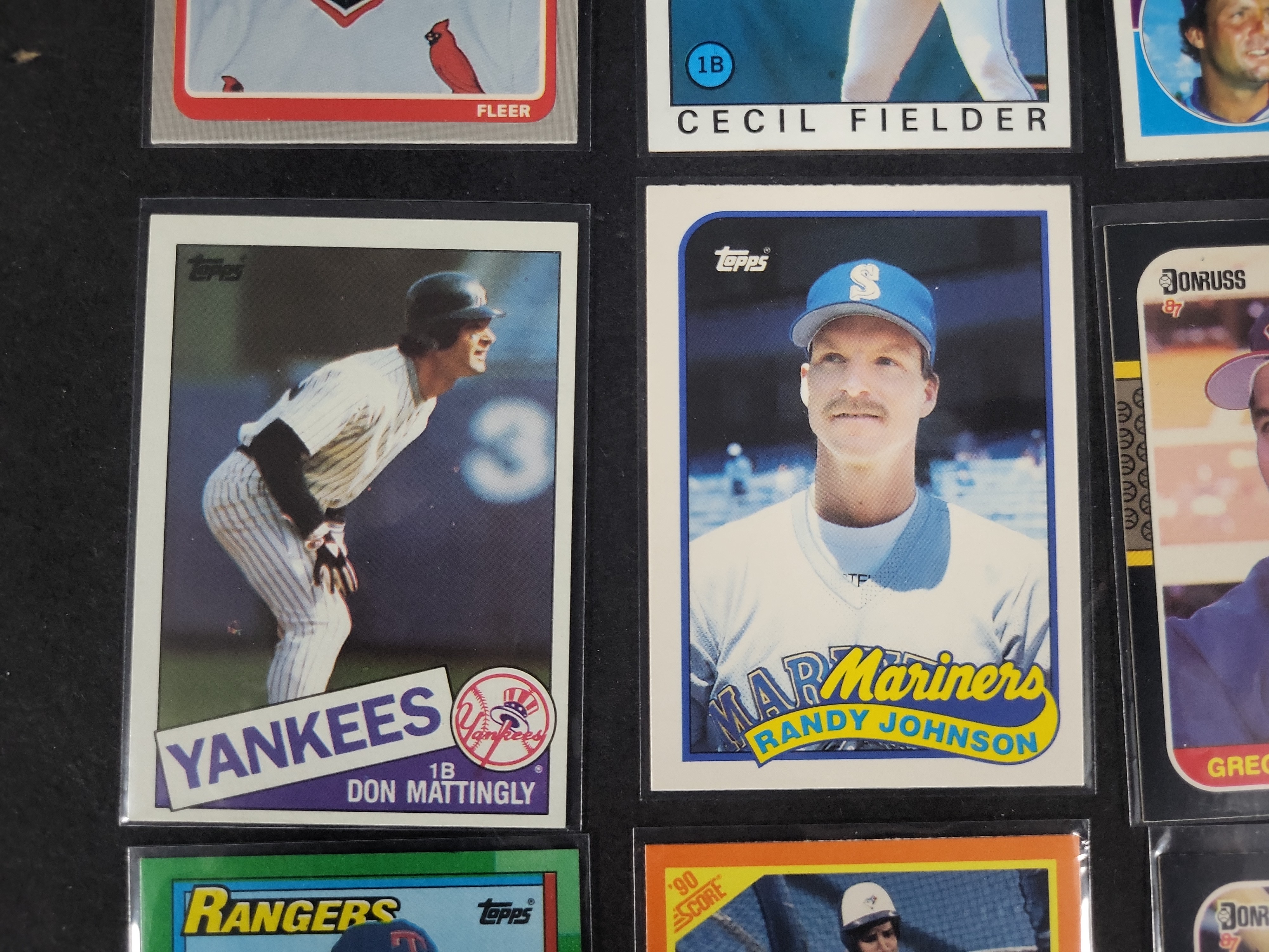 I03164 | A Collection of 12 Vintage Baseball and Crossover Trading Cards Including Rookies and Hall of Famers 1983-1990