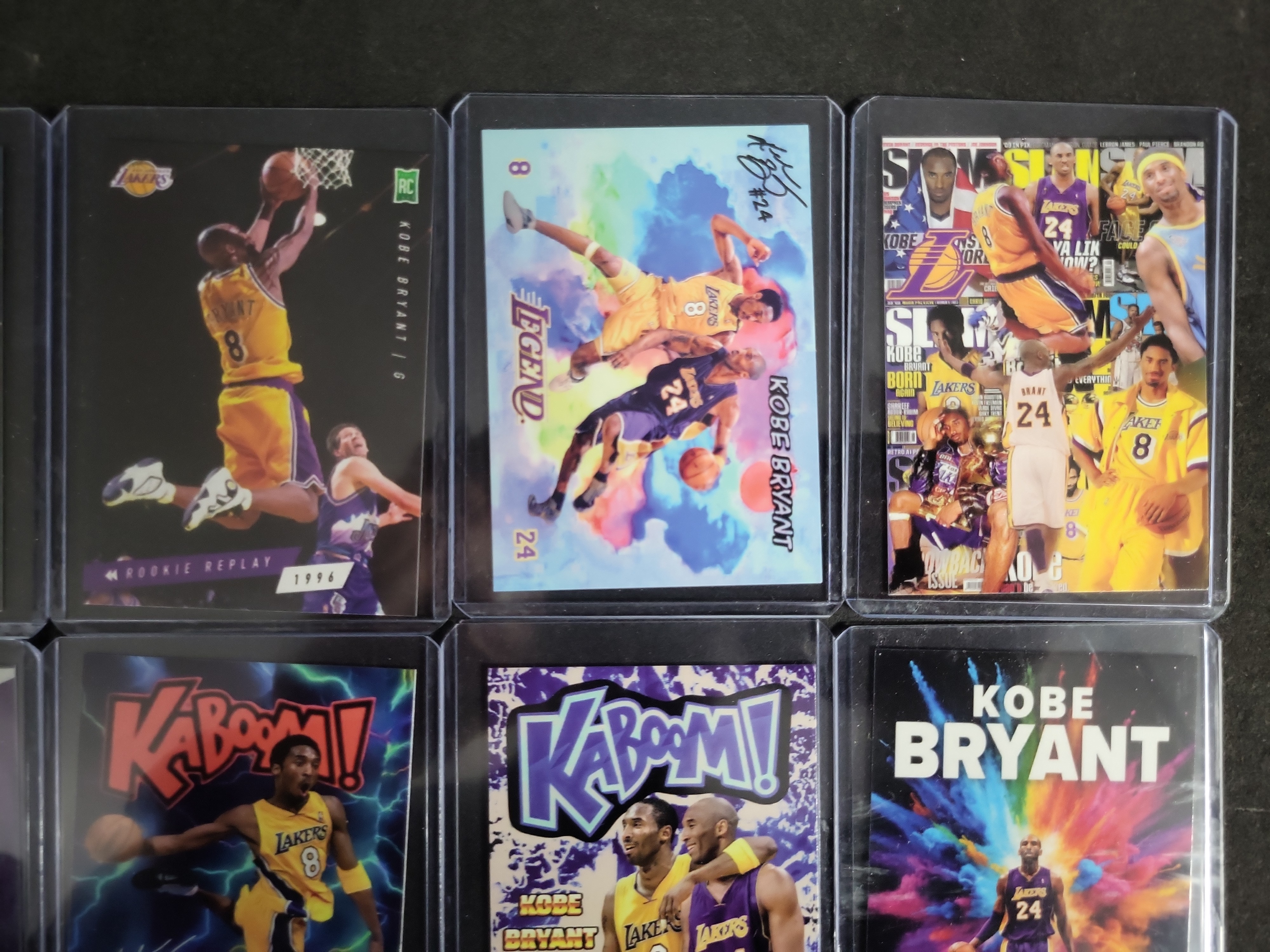 I03282 | A Collection of Eight Kobe Bryant Custom Art and Novelty Basketball Cards