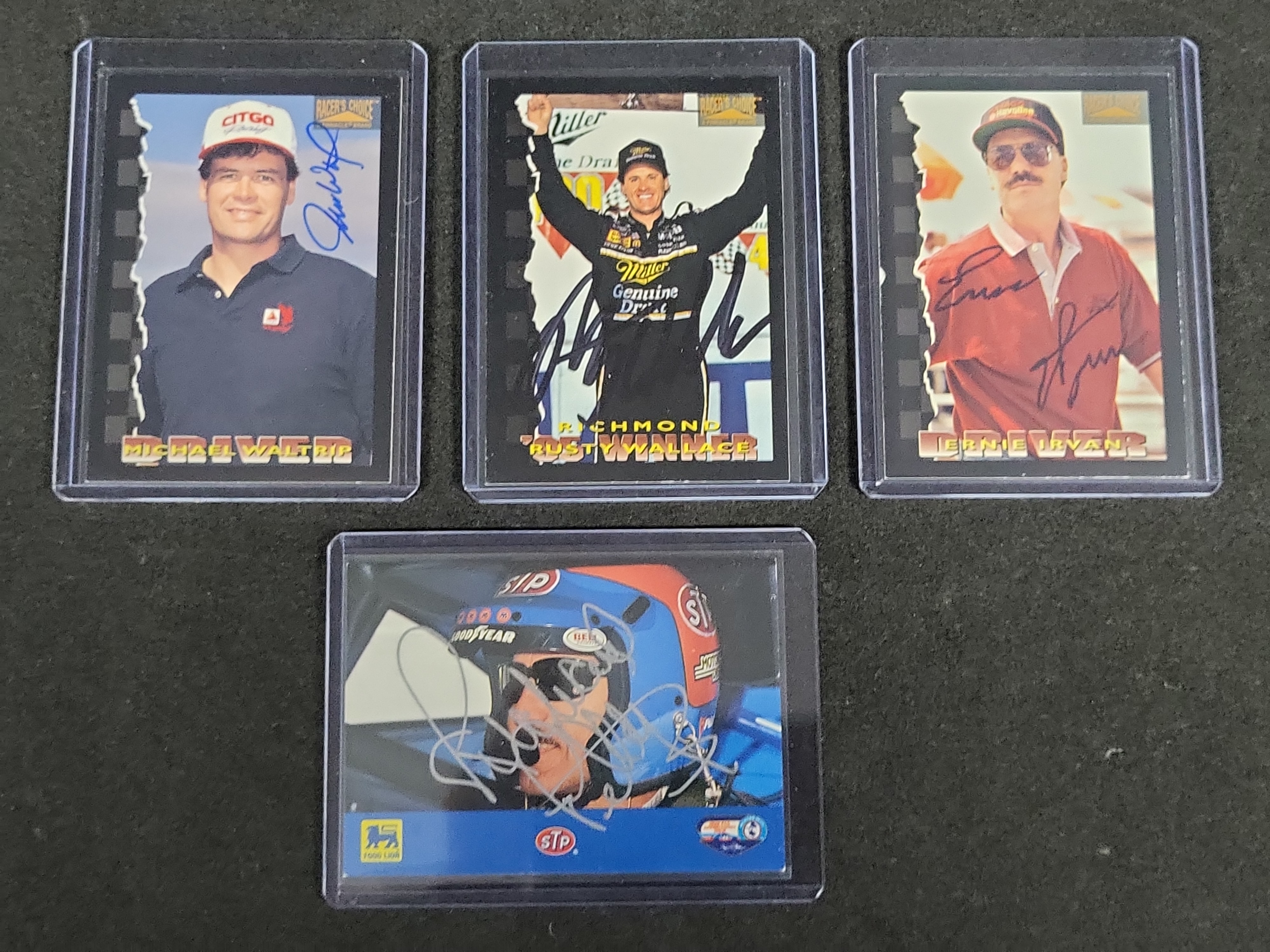 I03566 | A Lot of Four Autographed NASCAR Trading Cards Including Richard Petty and Rusty Wallace