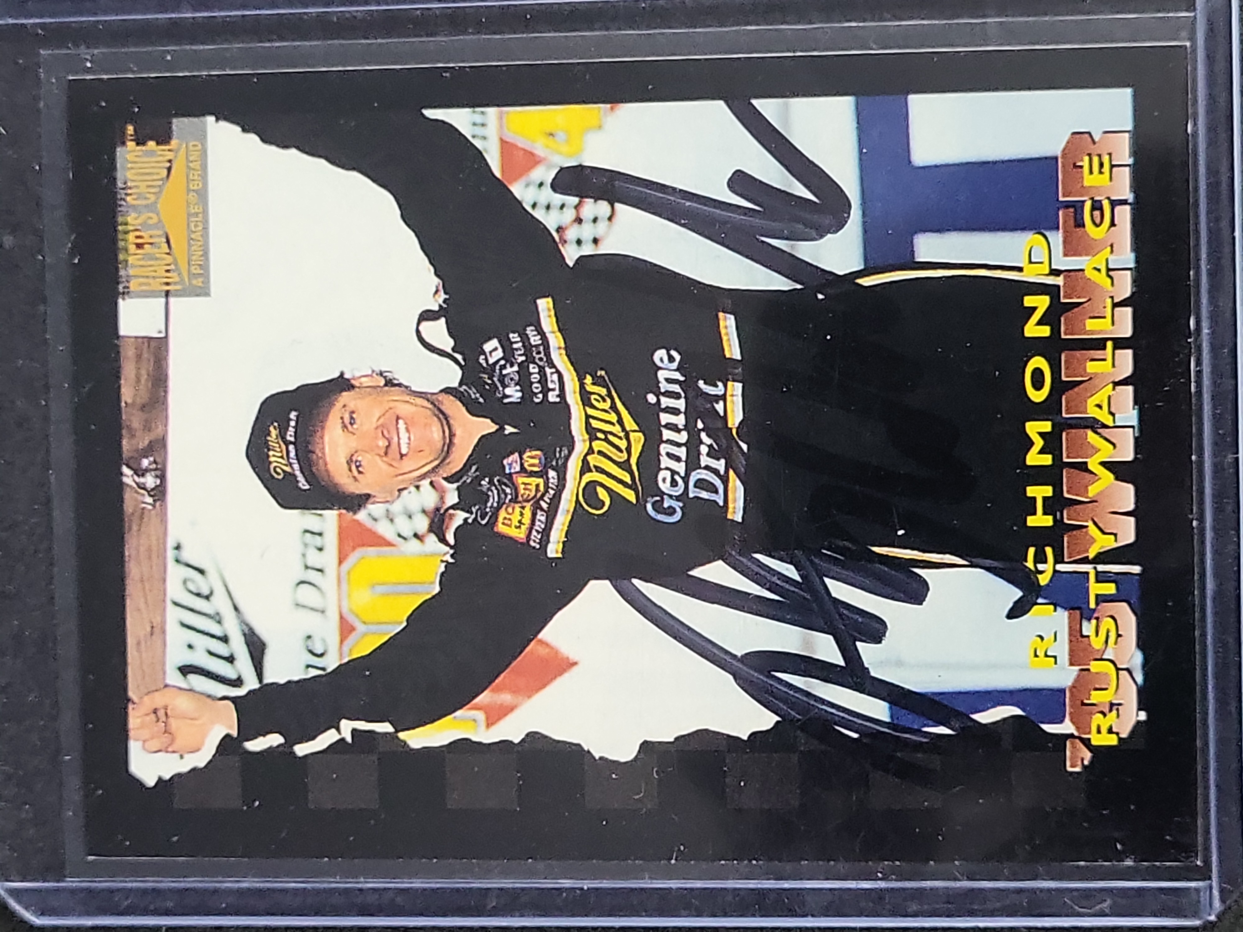 I03566 | A Lot of Four Autographed NASCAR Trading Cards Including Richard Petty and Rusty Wallace