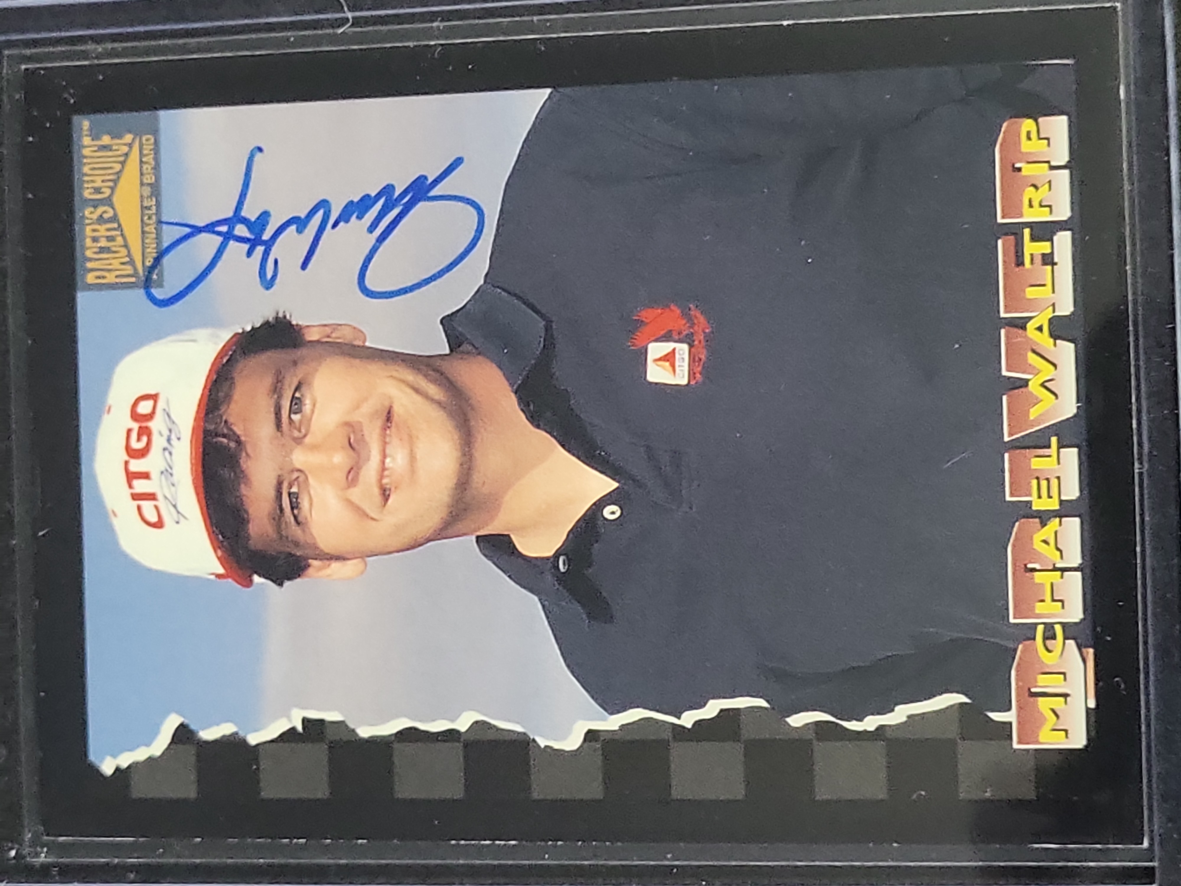 I03566 | A Lot of Four Autographed NASCAR Trading Cards Including Richard Petty and Rusty Wallace