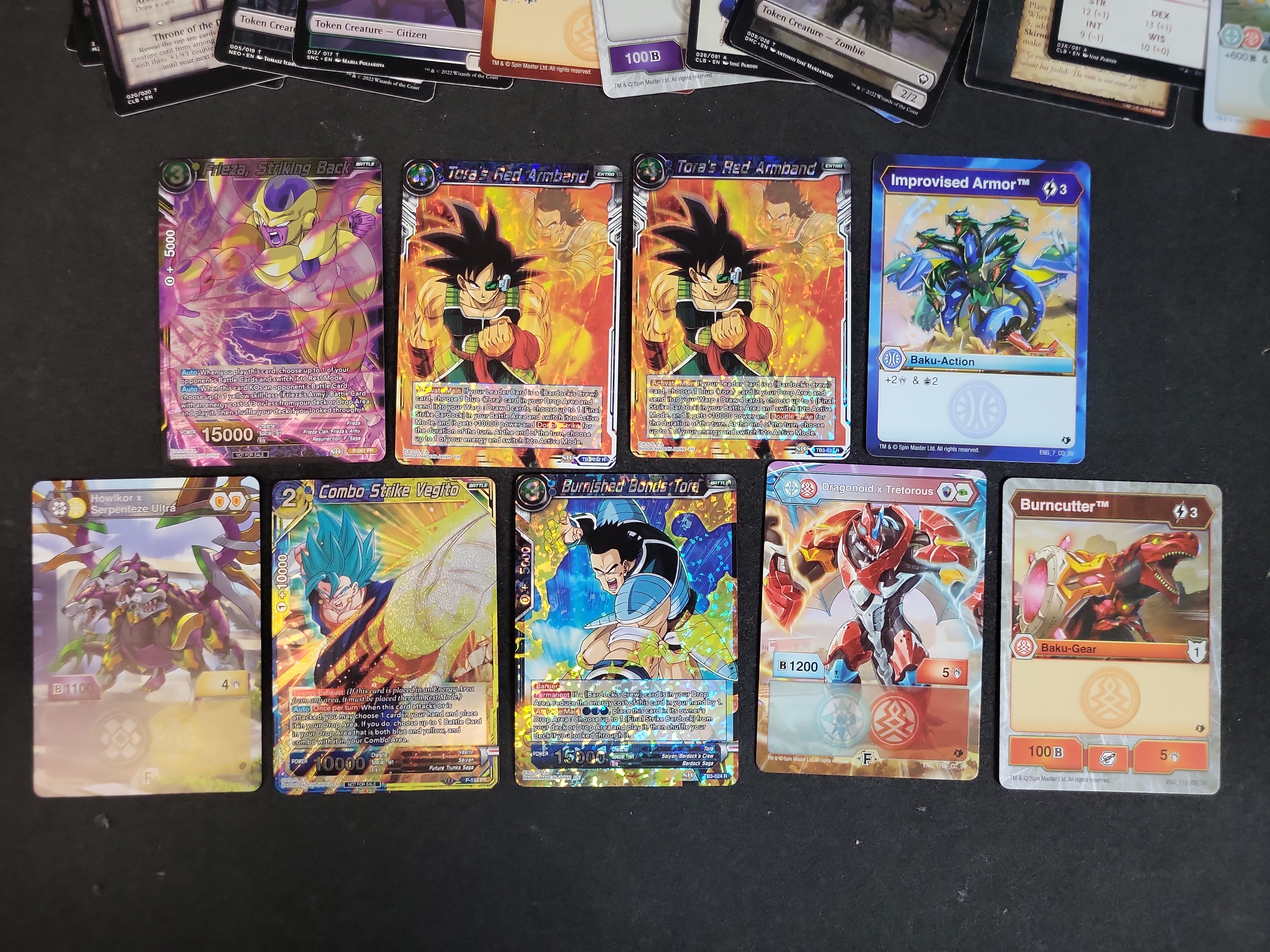 I03936 | An Assortment of Trading Cards Including Dragon Ball Super, Yu-Gi-Oh!, Bakugan, and Magic: The Gathering