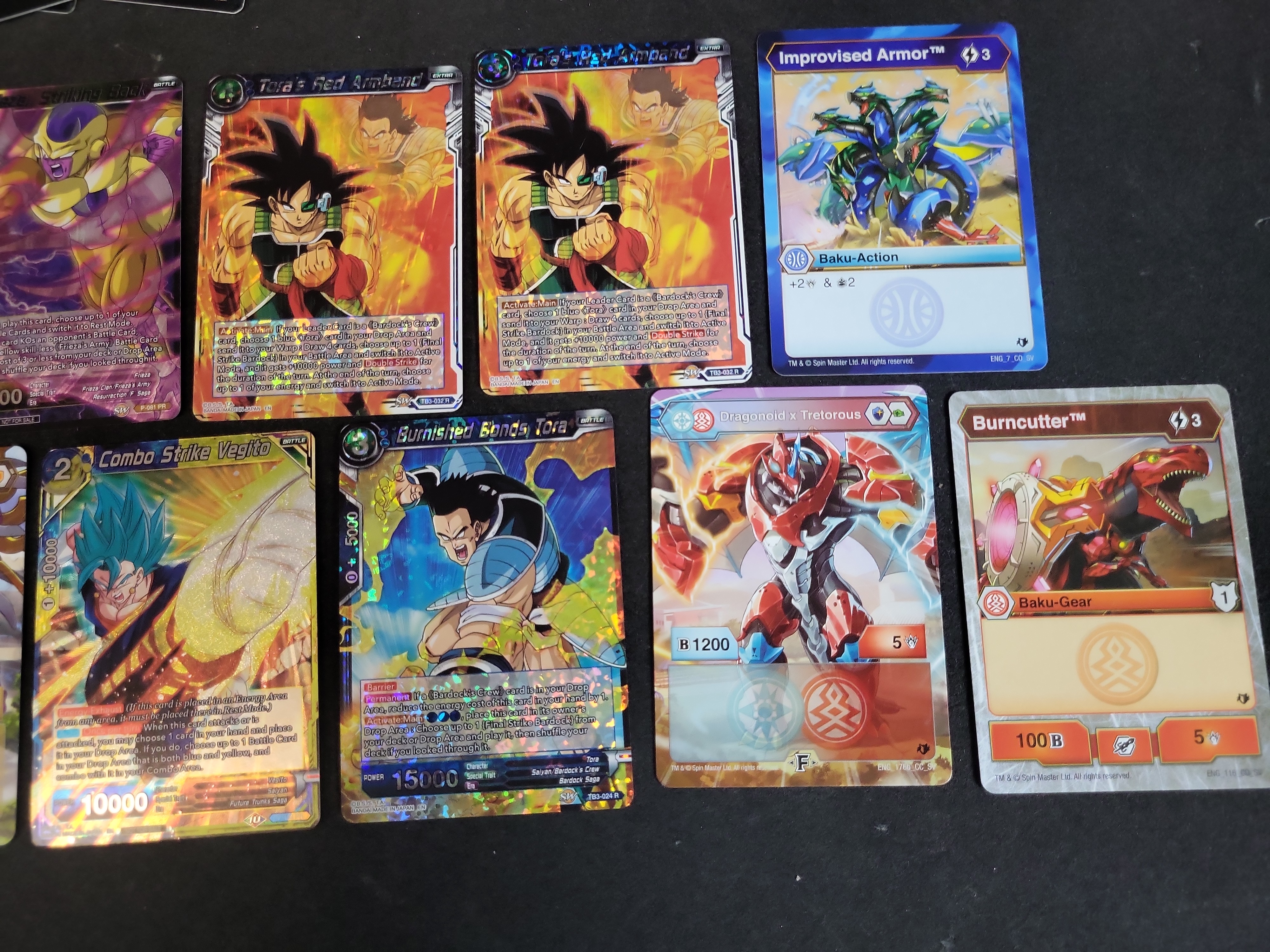 I03936 | An Assortment of Trading Cards Including Dragon Ball Super, Yu-Gi-Oh!, Bakugan, and Magic: The Gathering