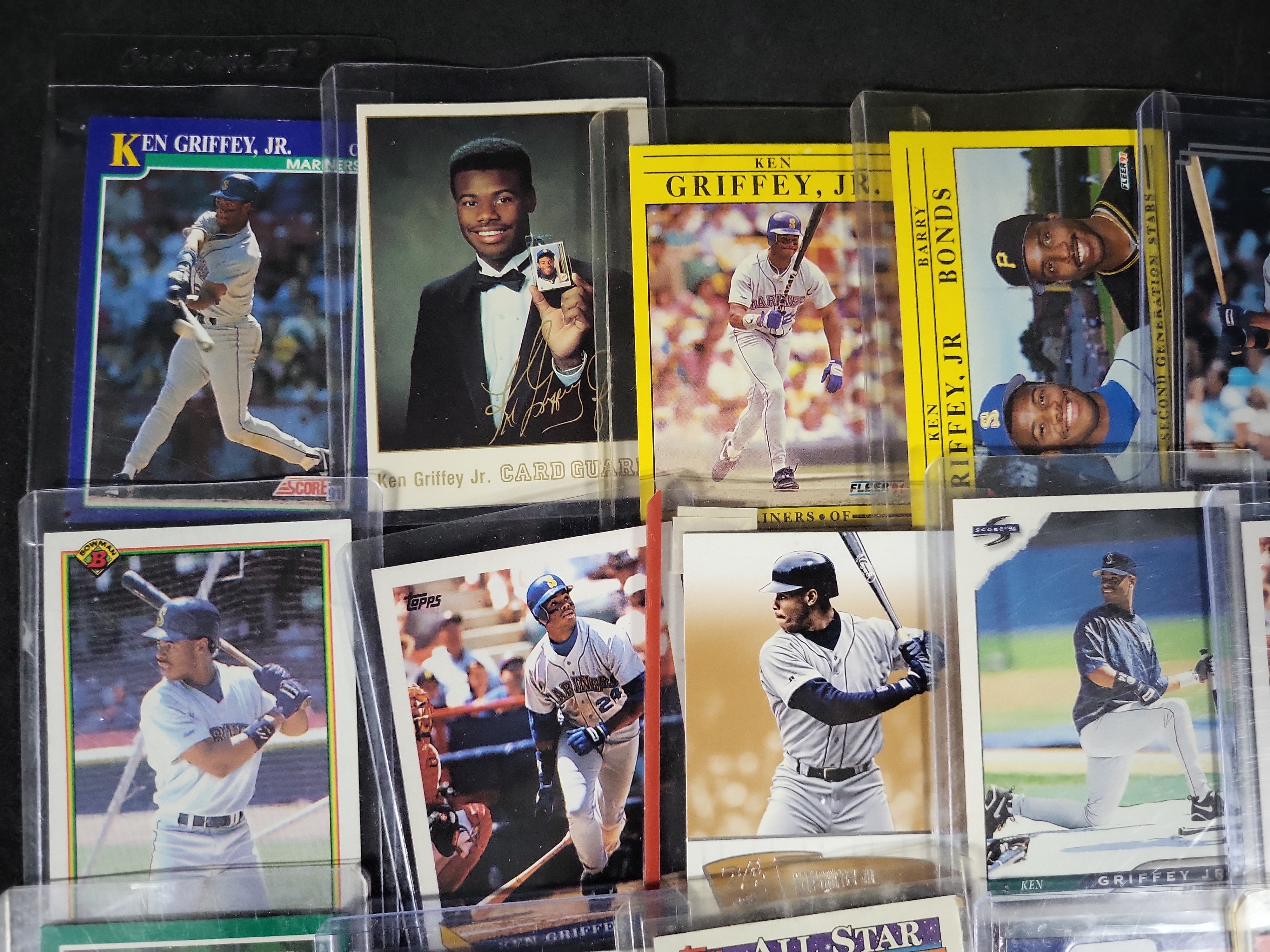 I03840 | A Collection of 24 Ken Griffey Jr. Baseball Cards Including Topps Upper Deck Fleer and Donruss