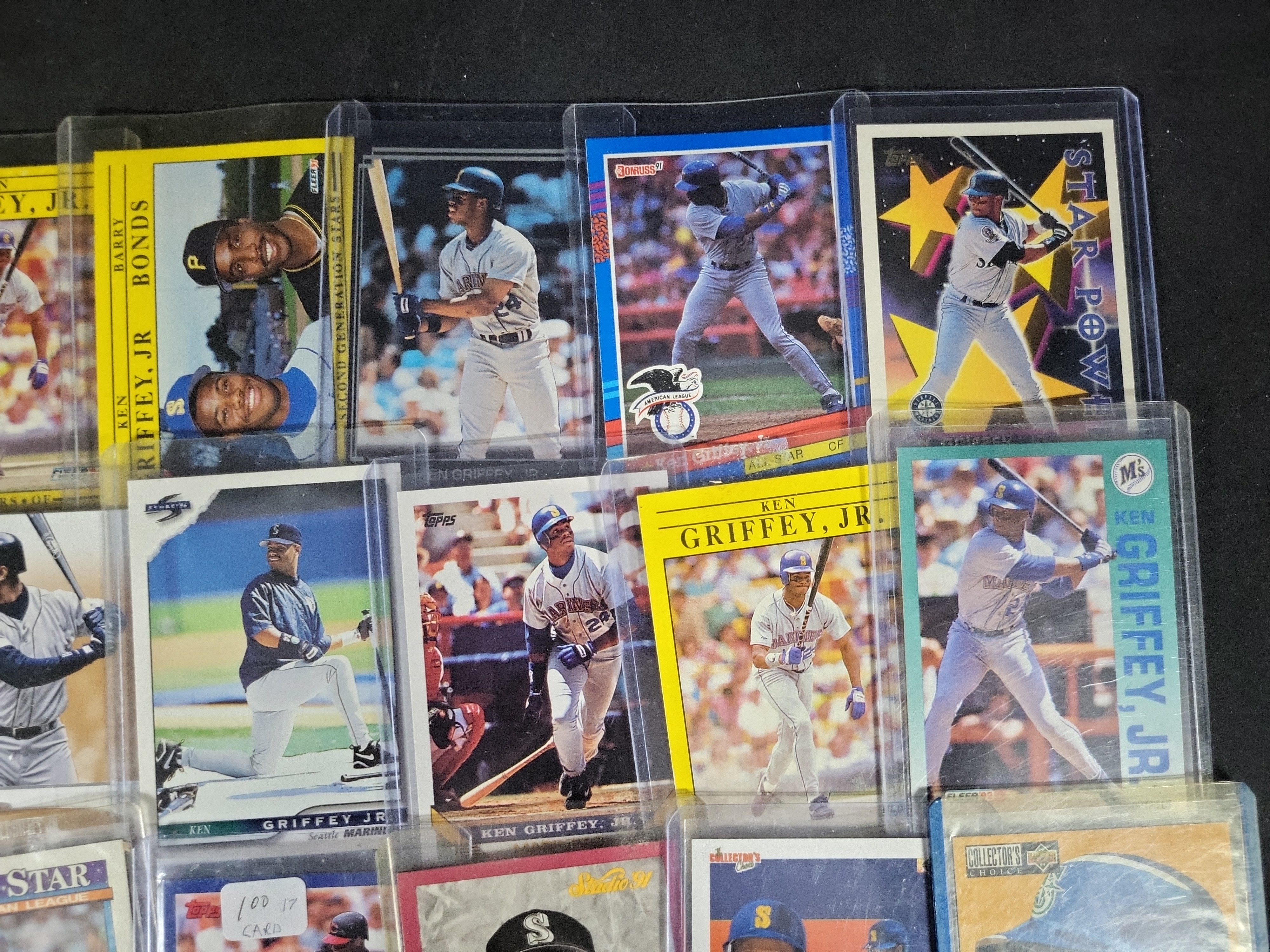 I03840 | A Collection of 24 Ken Griffey Jr. Baseball Cards Including Topps Upper Deck Fleer and Donruss