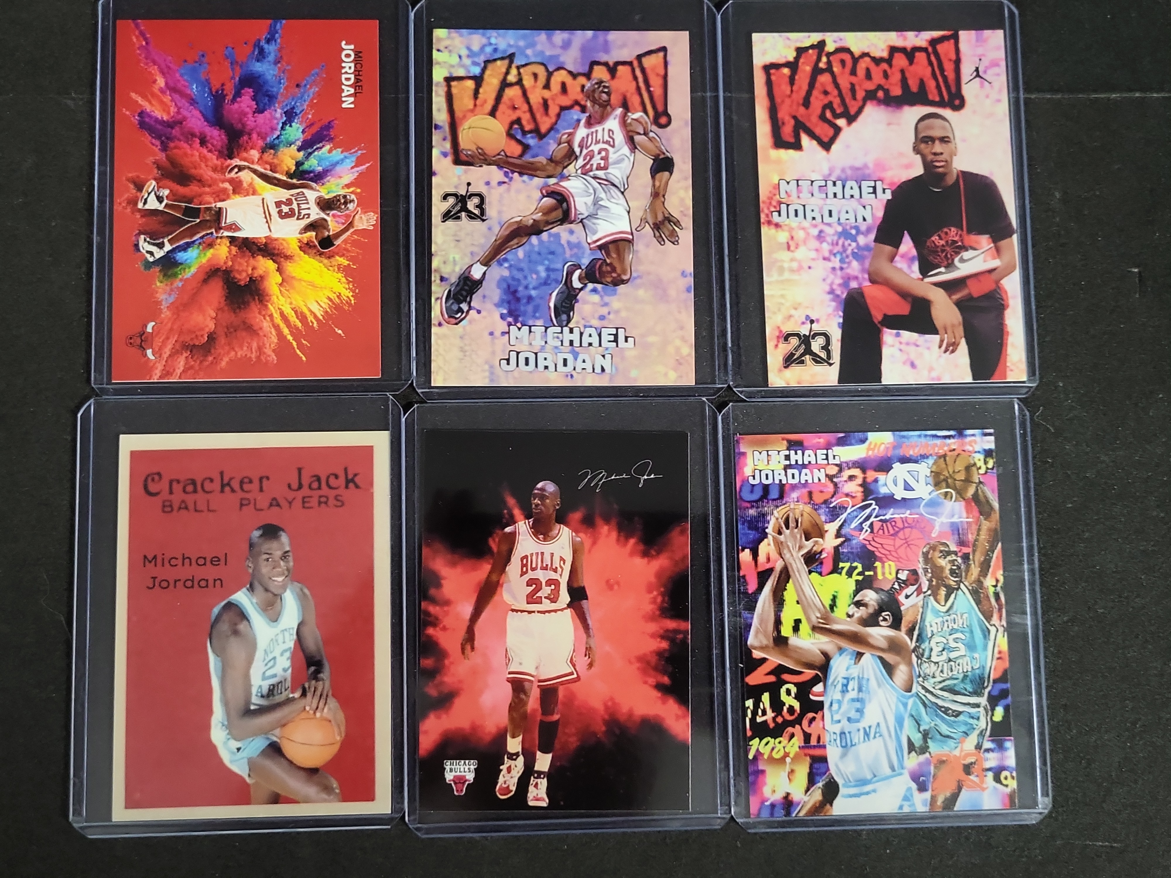 I03272 | Lot of Six Michael Jordan Custom Art and Novelty Basketball Cards Including Kaboom and Cracker Jack Homages