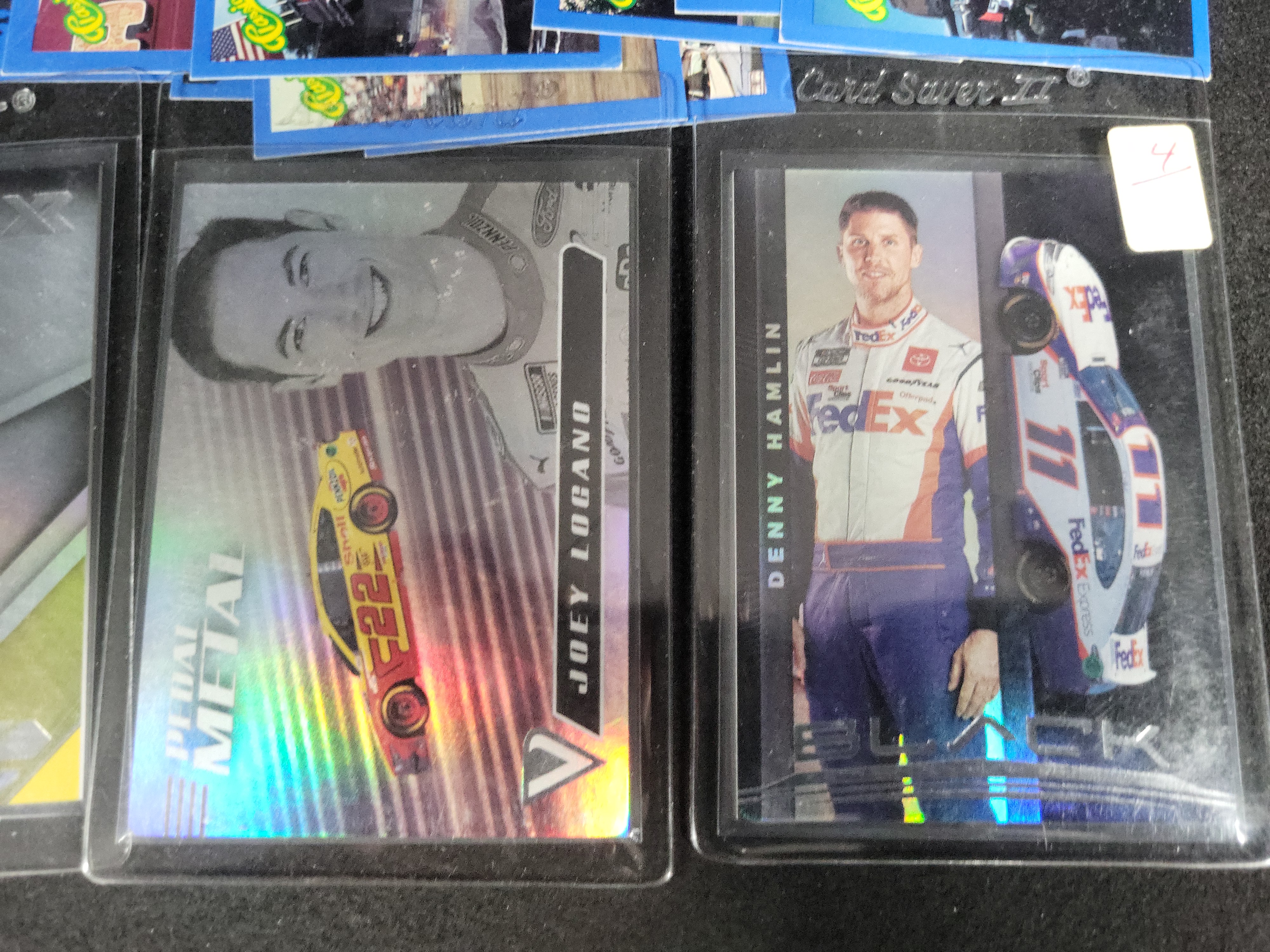 I03841 | An Assortment of NASCAR Tiger Woods Golf WWE and Monster Truck Trading Cards