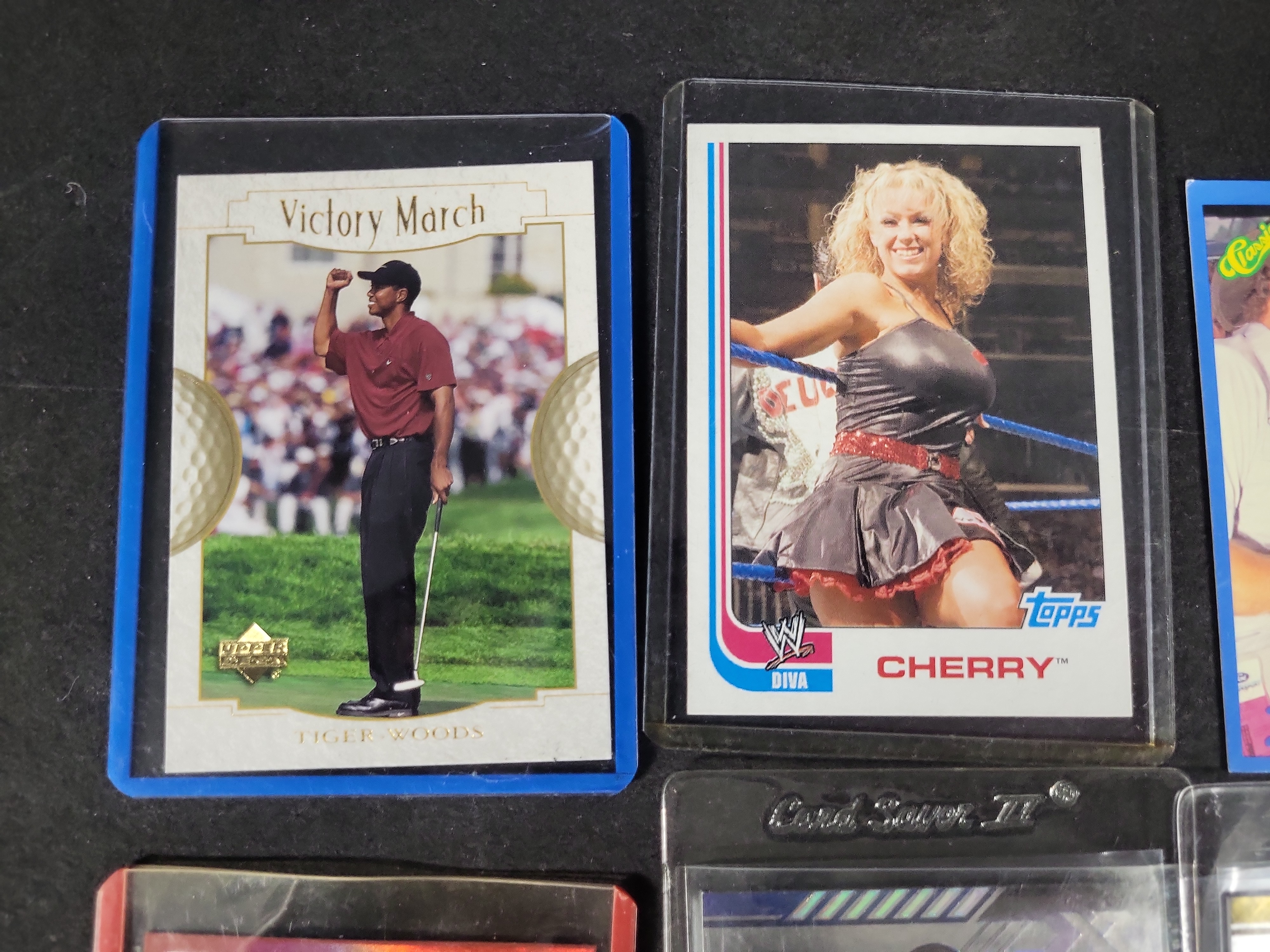 I03841 | An Assortment of NASCAR Tiger Woods Golf WWE and Monster Truck Trading Cards