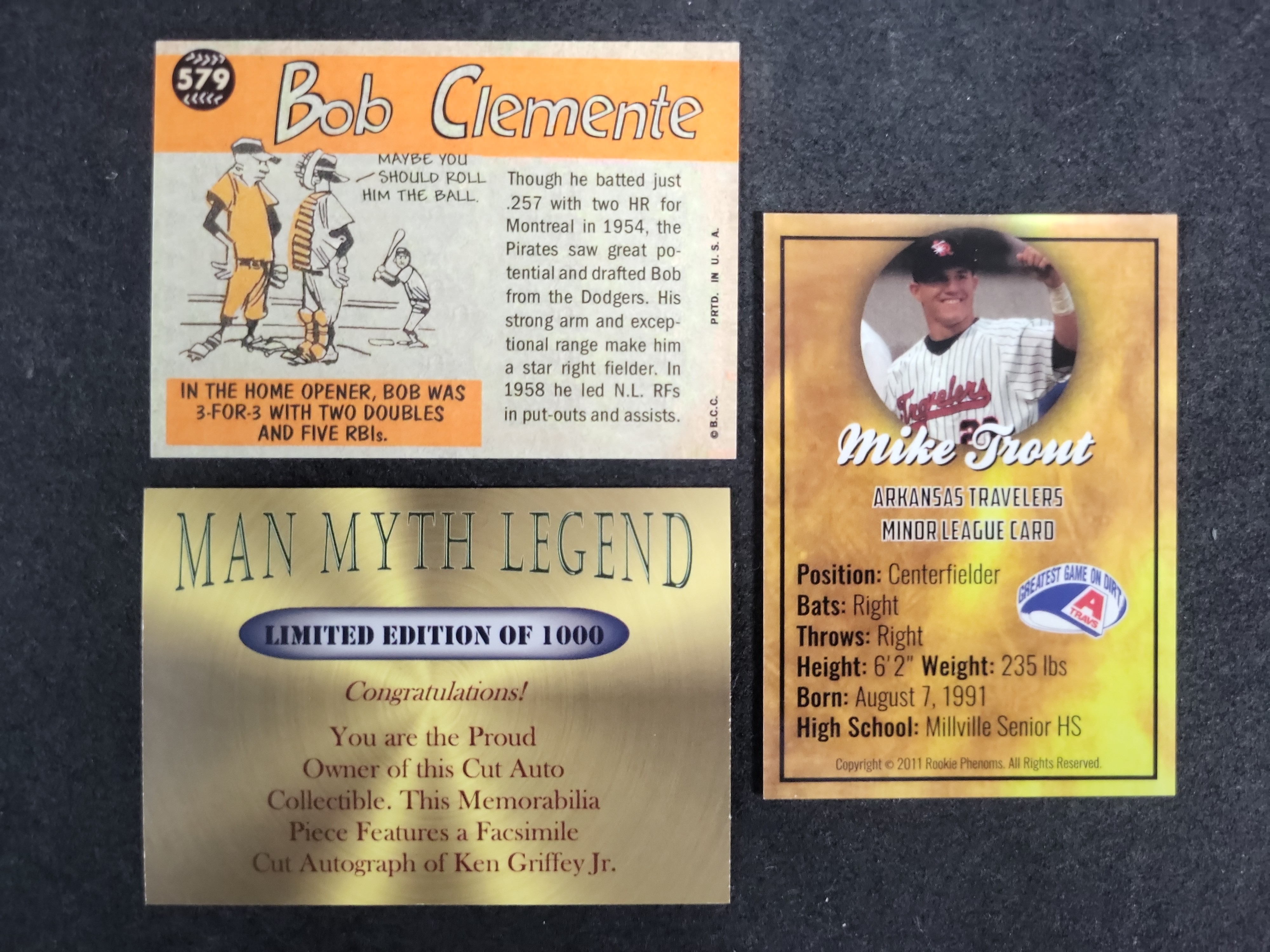 I03584 | A Trio of Baseball Trading Cards Featuring Bob Clemente, Ken Griffey Jr., and Mike Trout