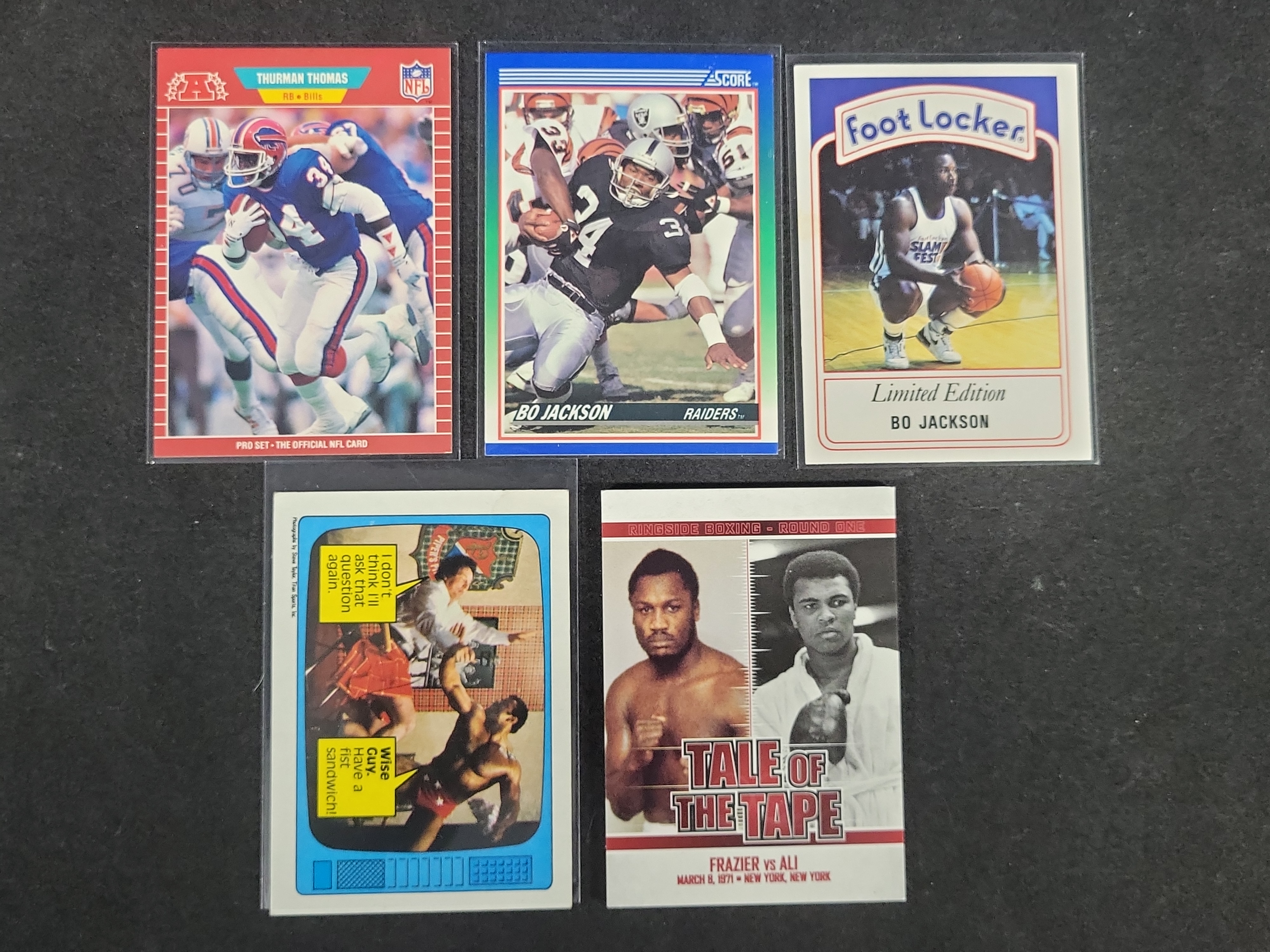 I03167 | Five Assorted Sports and Entertainment Trading Cards Including Bo Jackson and Thurman Thomas