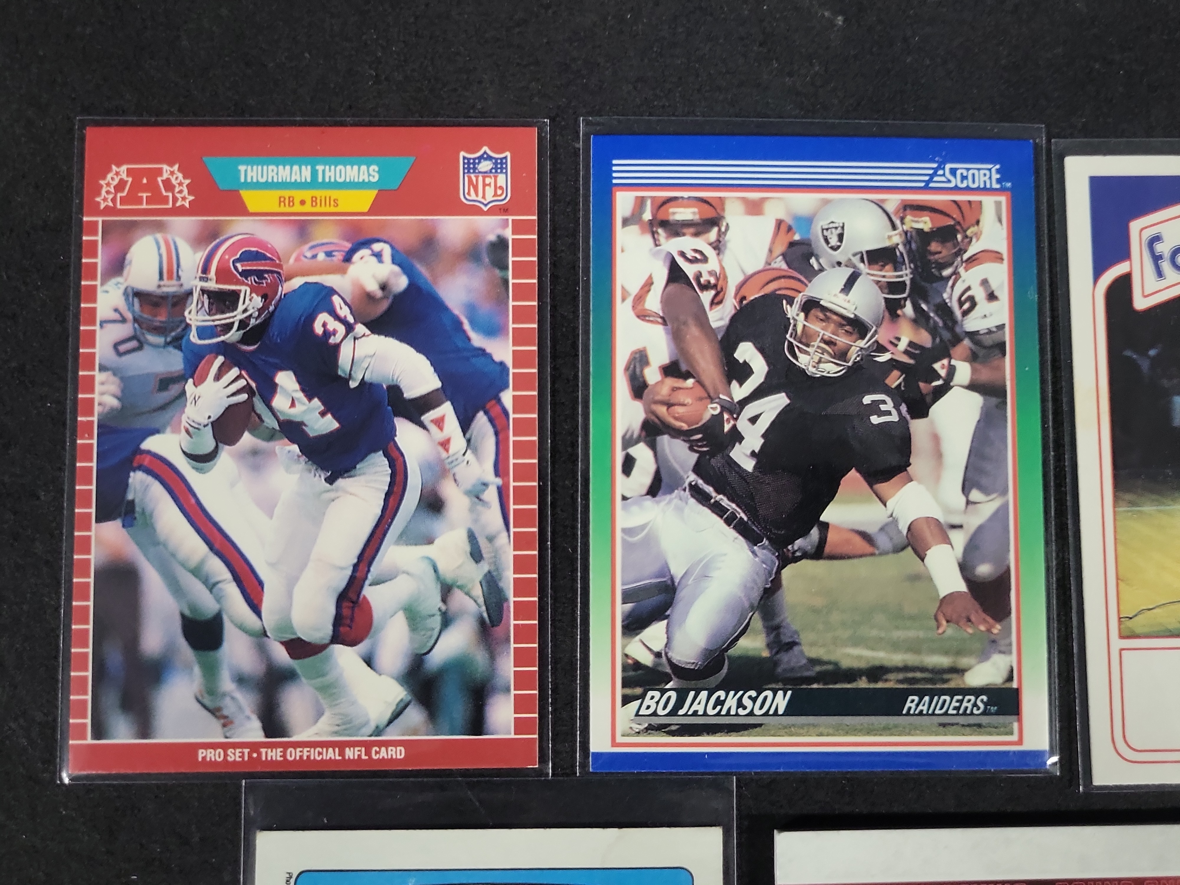 I03167 | Five Assorted Sports and Entertainment Trading Cards Including Bo Jackson and Thurman Thomas