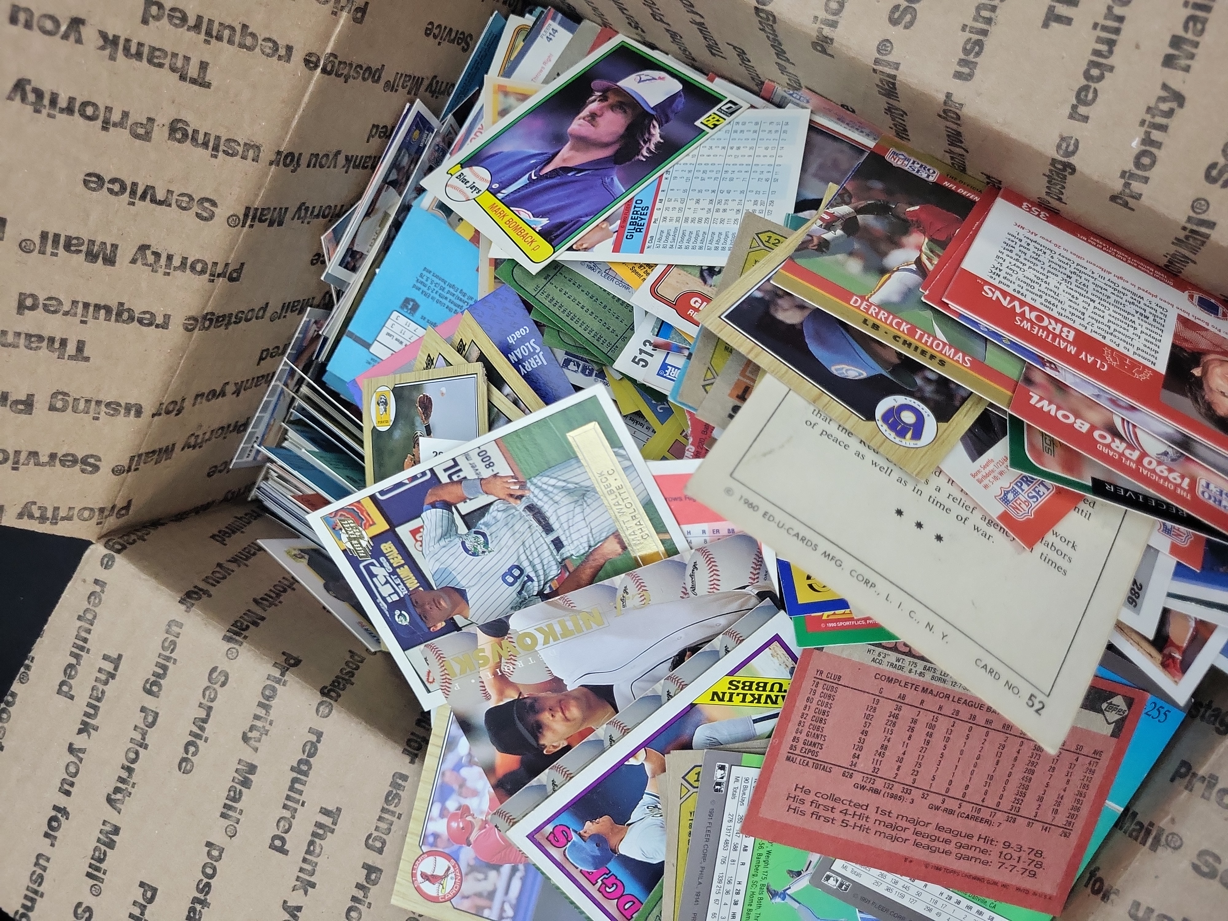 I03329 | An Assortment of Vintage Sports Trading Cards Including Baseball, Football, and Basketball, circa 1970s-1990s