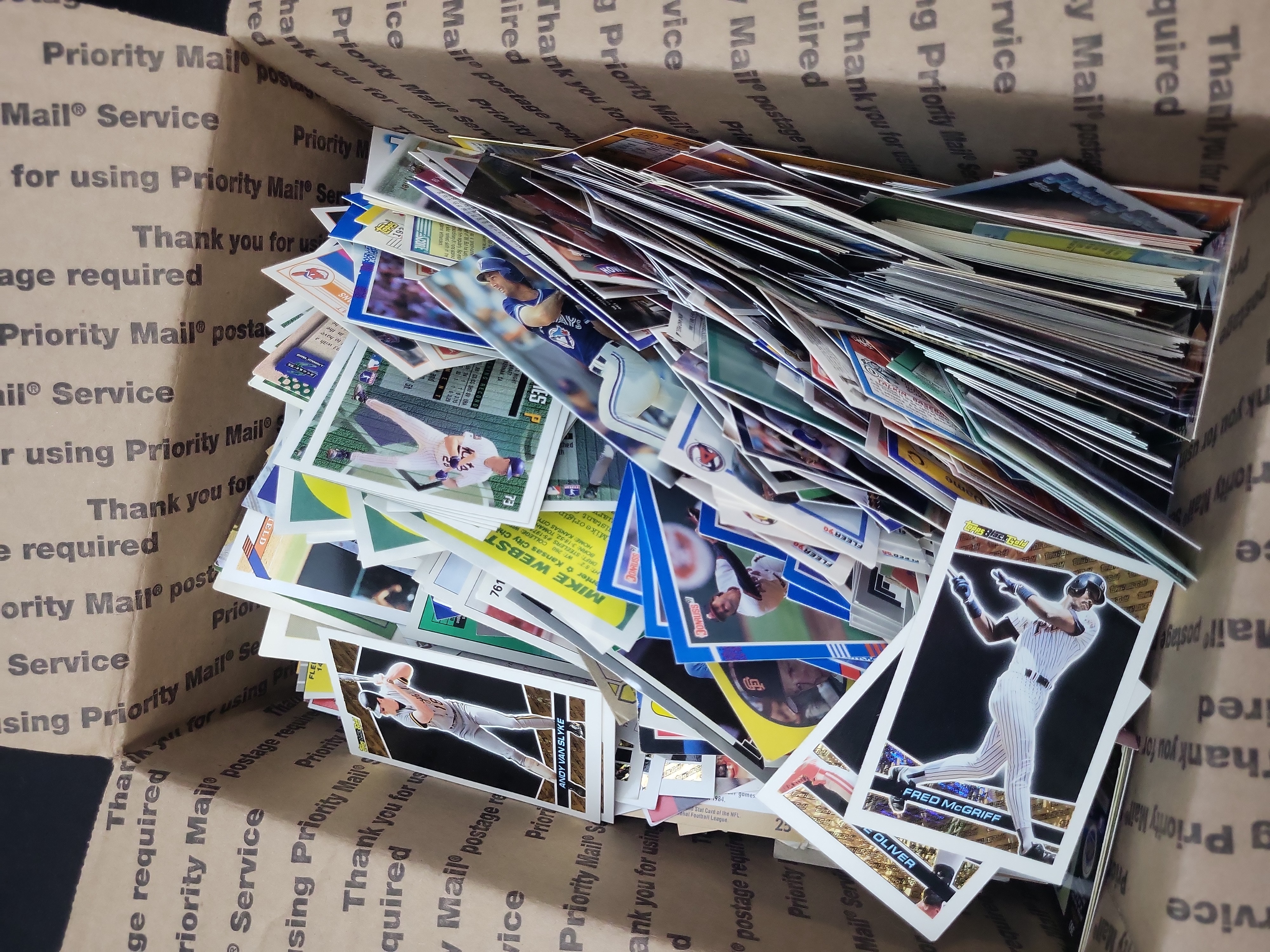 I03330 | An Assortment of Vintage Sports Trading Cards Including 1993 Topps Black Gold Inserts