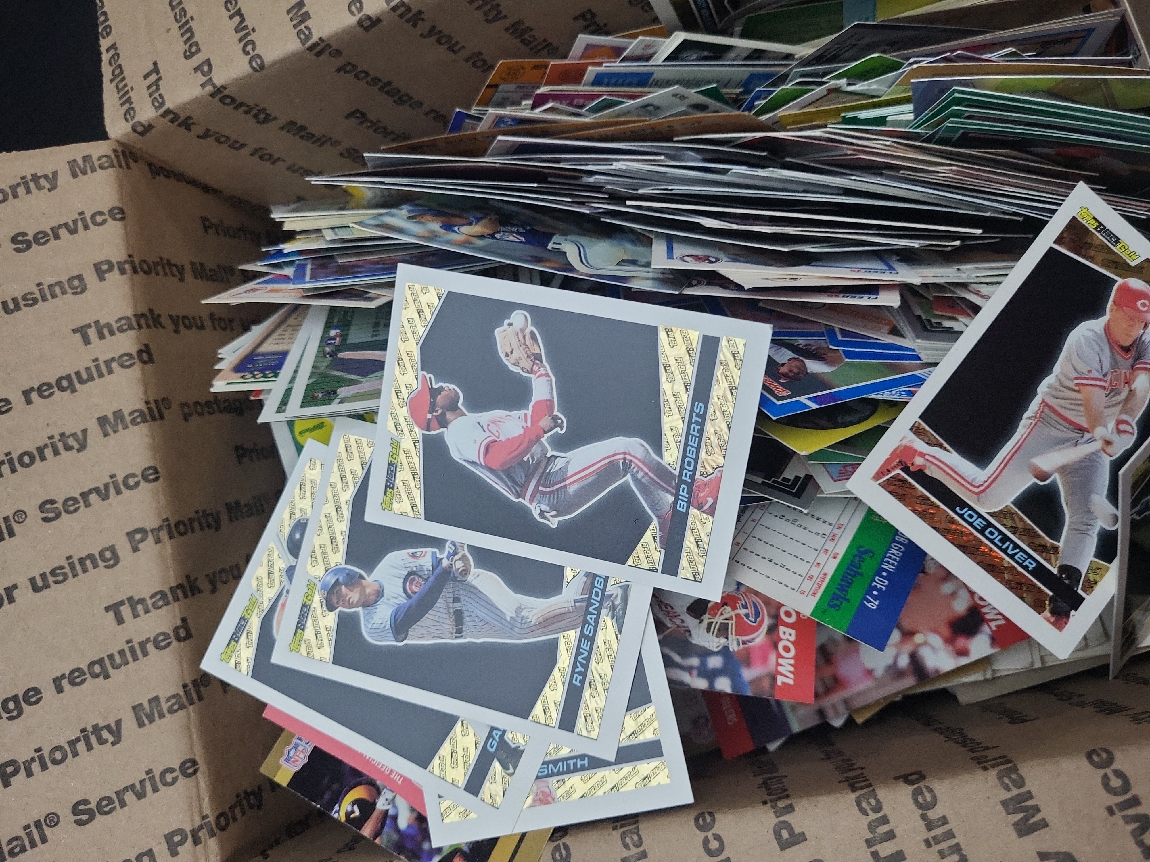 I03330 | An Assortment of Vintage Sports Trading Cards Including 1993 Topps Black Gold Inserts