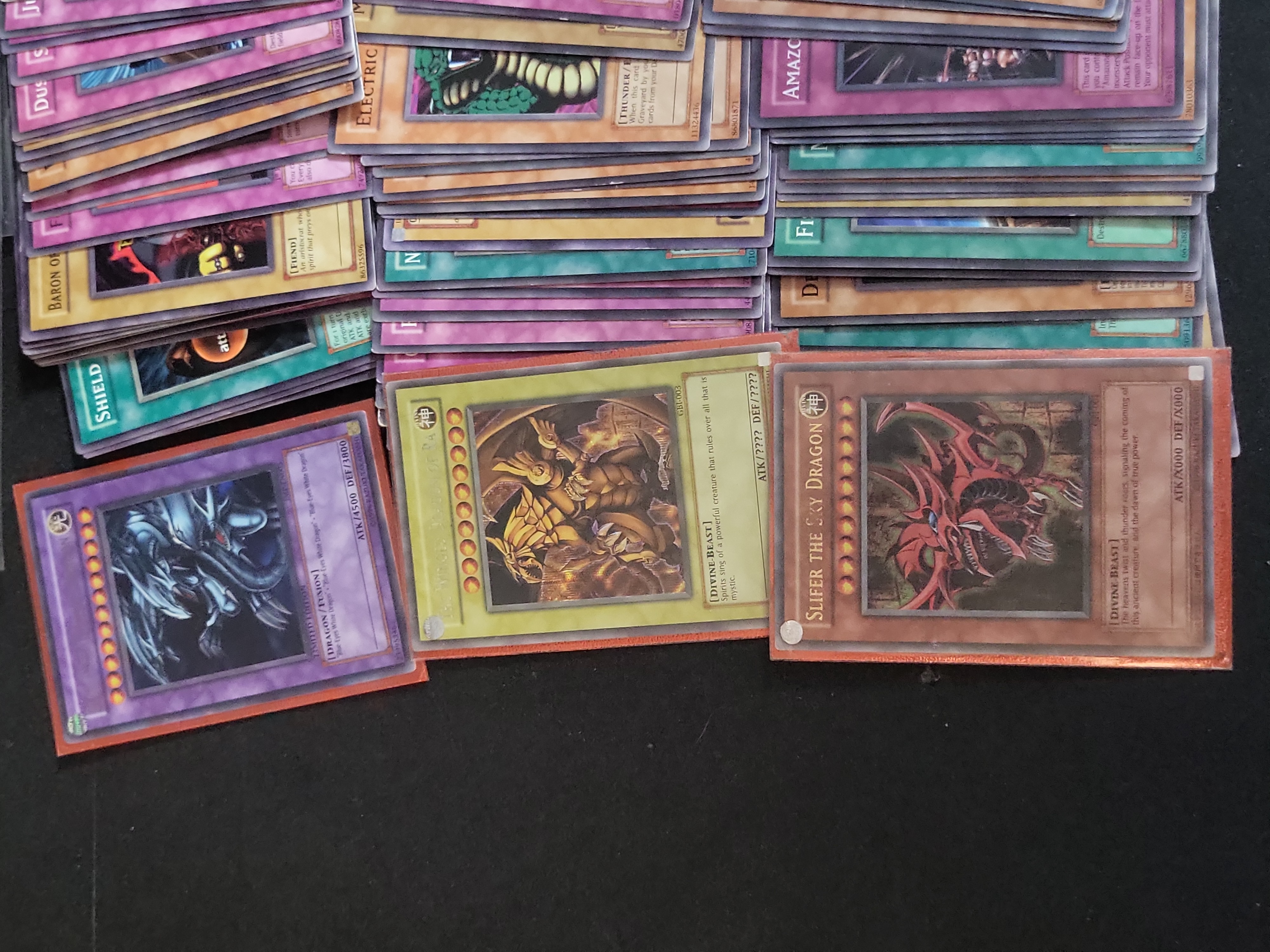 I02764 | An Assortment of Yu-Gi-Oh! Trading Cards Including Egyptian God GBI Promos and Promotional Sets