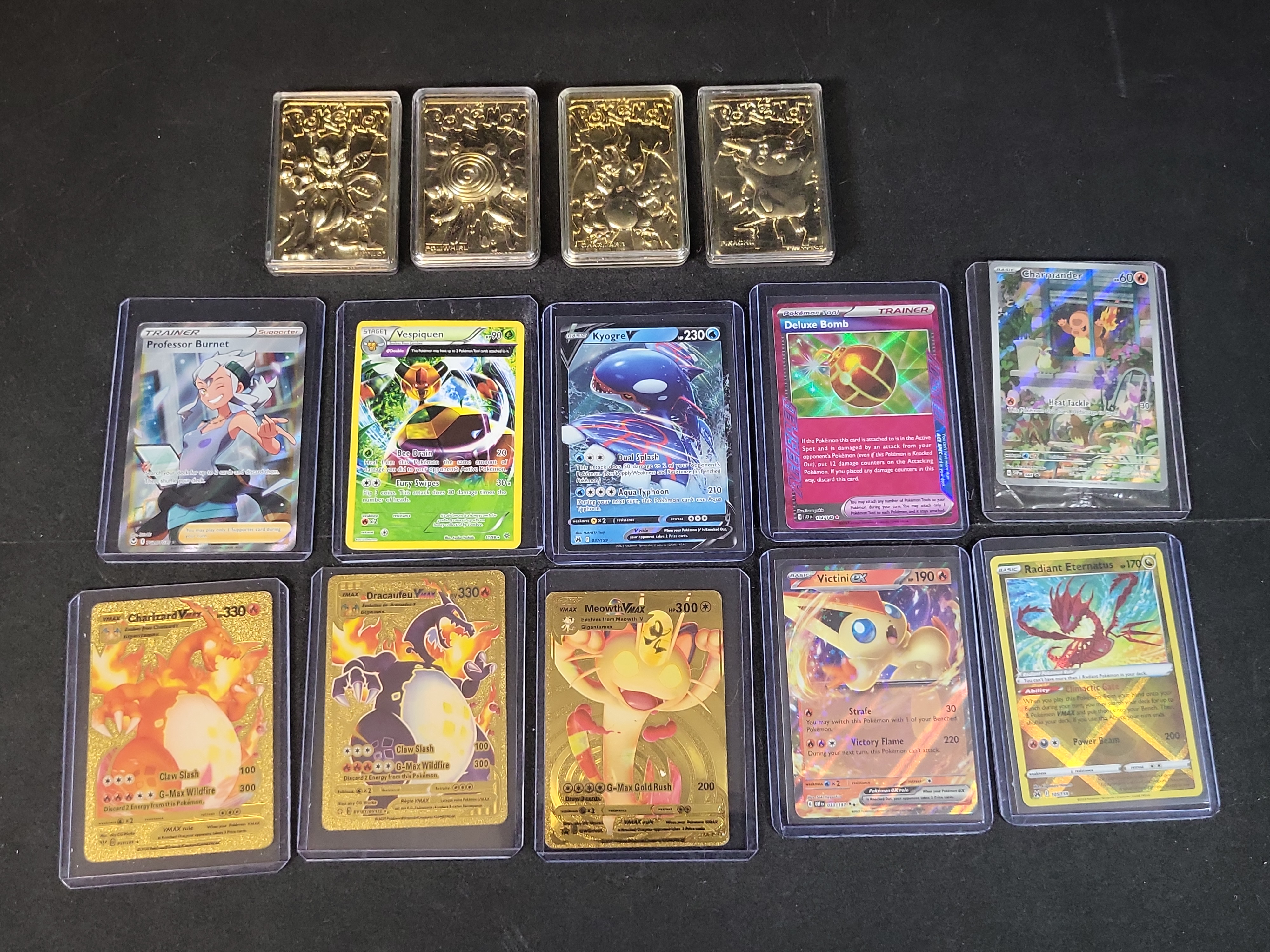 I02937 | An Assortment of Pokémon Collectibles Including 1999 Burger King 23-Karat Gold-Plated Cards and Modern TCG Cards
