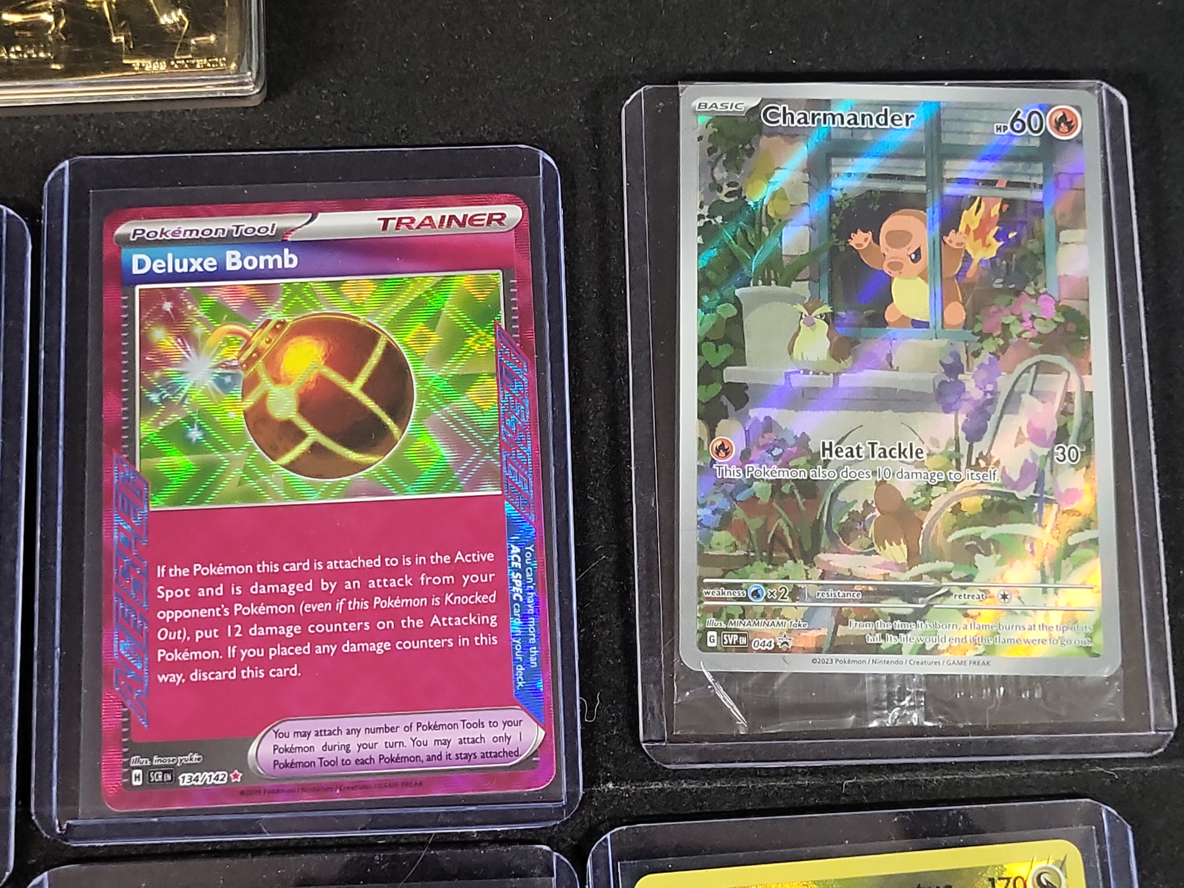 I02937 | An Assortment of Pokémon Collectibles Including 1999 Burger King 23-Karat Gold-Plated Cards and Modern TCG Cards