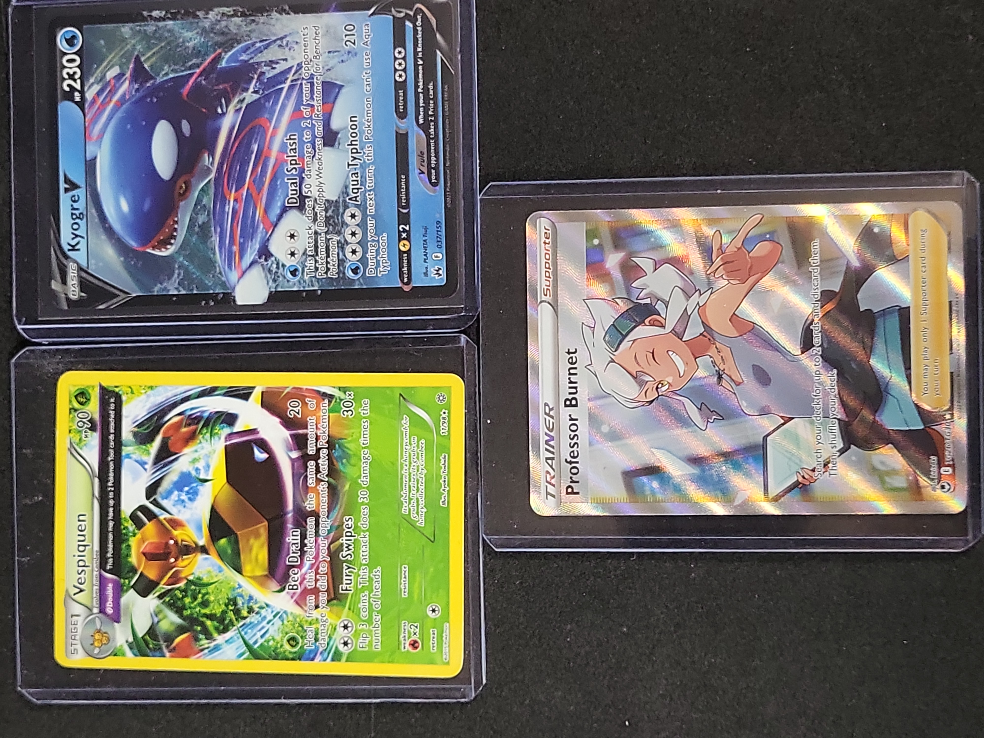 I02937 | An Assortment of Pokémon Collectibles Including 1999 Burger King 23-Karat Gold-Plated Cards and Modern TCG Cards