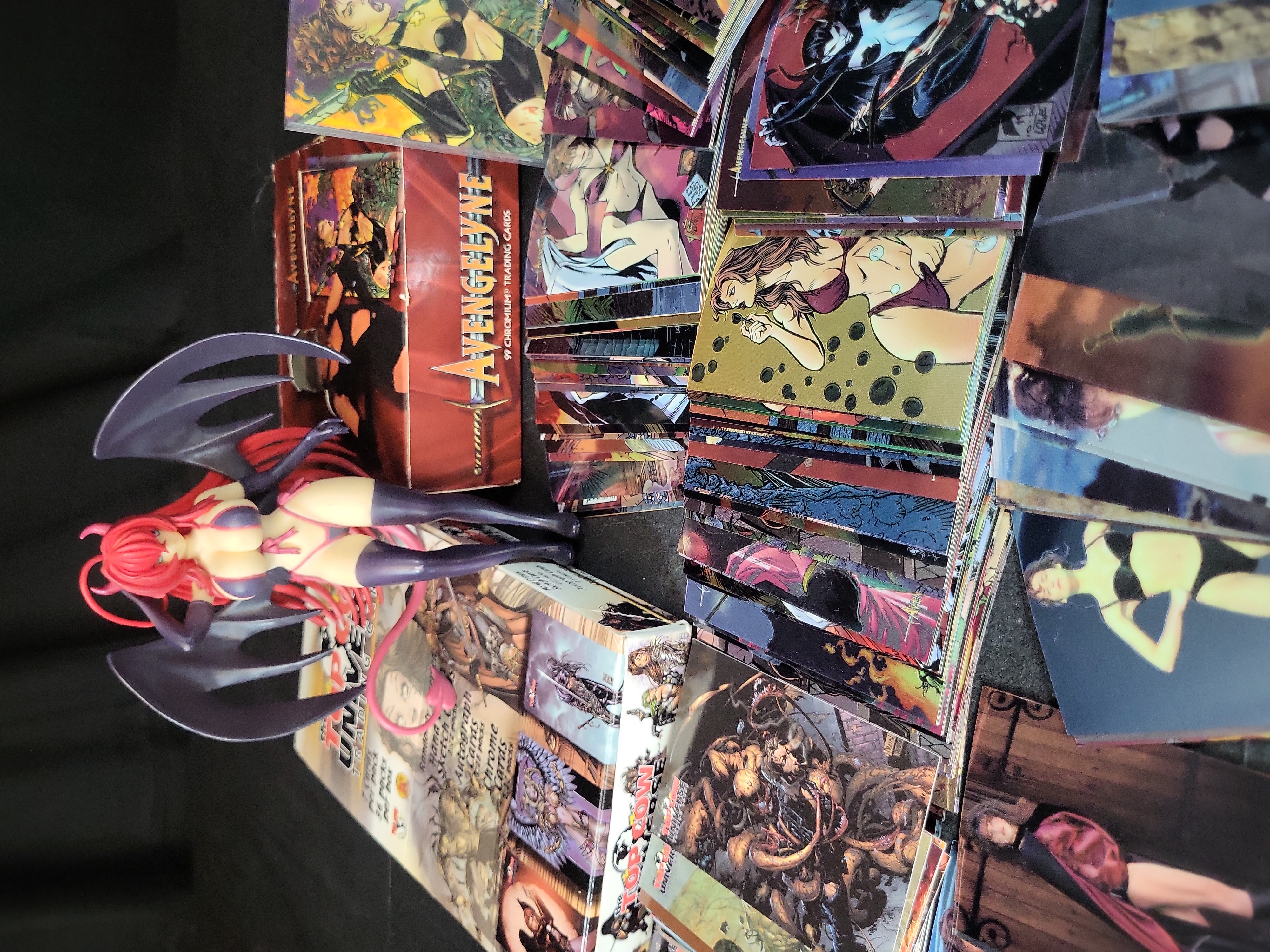 I03664 | A Collection of Top Cow and Avengelyne Trading Cards and a Darkstalkers Lilith Aensland Figure