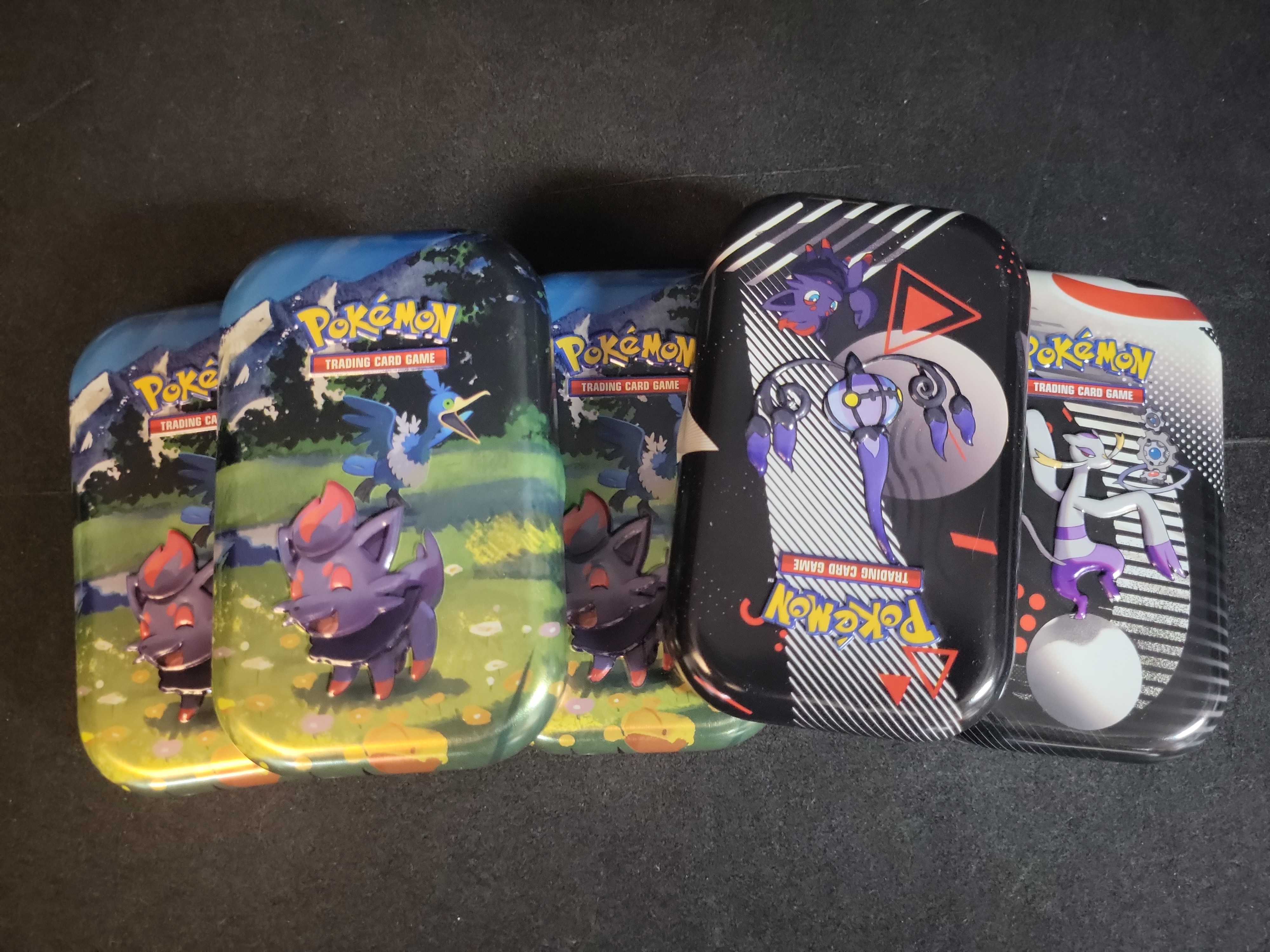 I02746 | A Collection of Pokemon TCG Cards and Unova Series Mini Tins