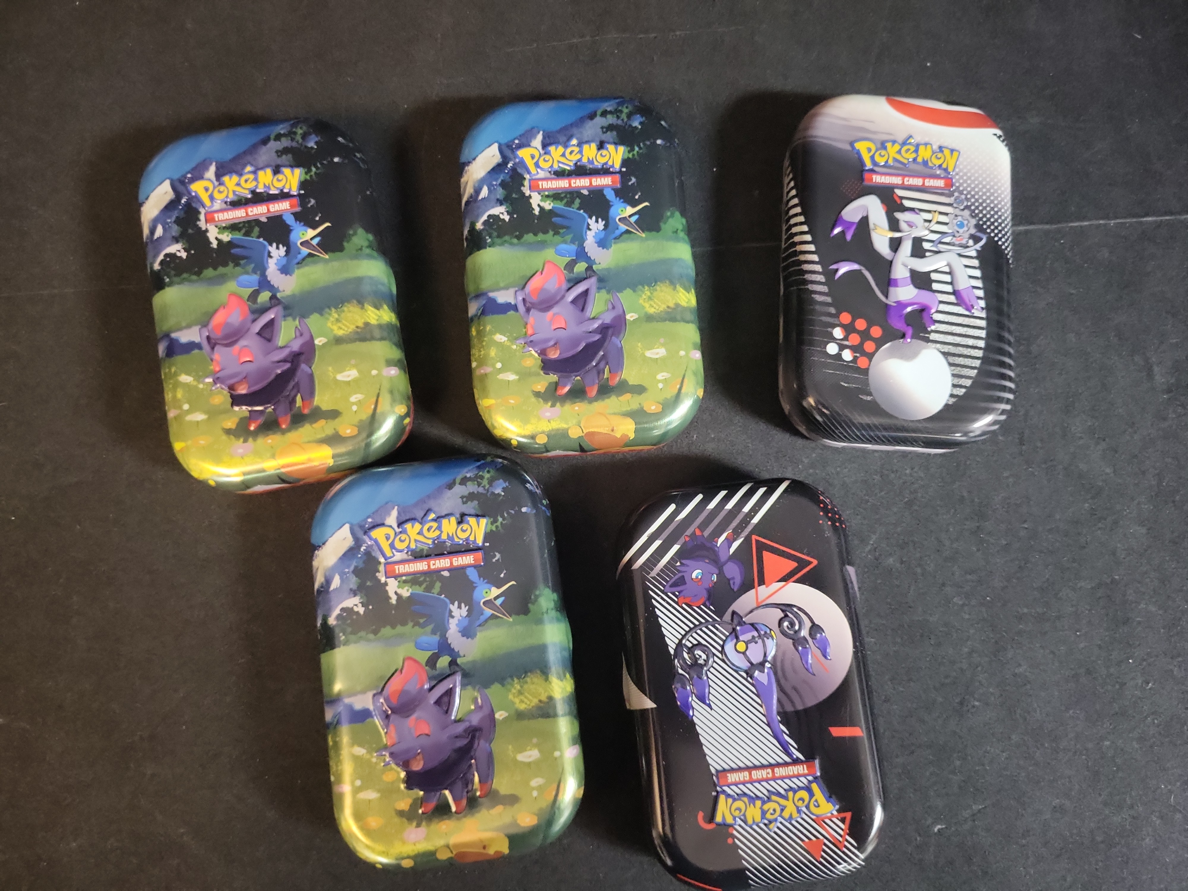 I02746 | A Collection of Pokemon TCG Cards and Unova Series Mini Tins