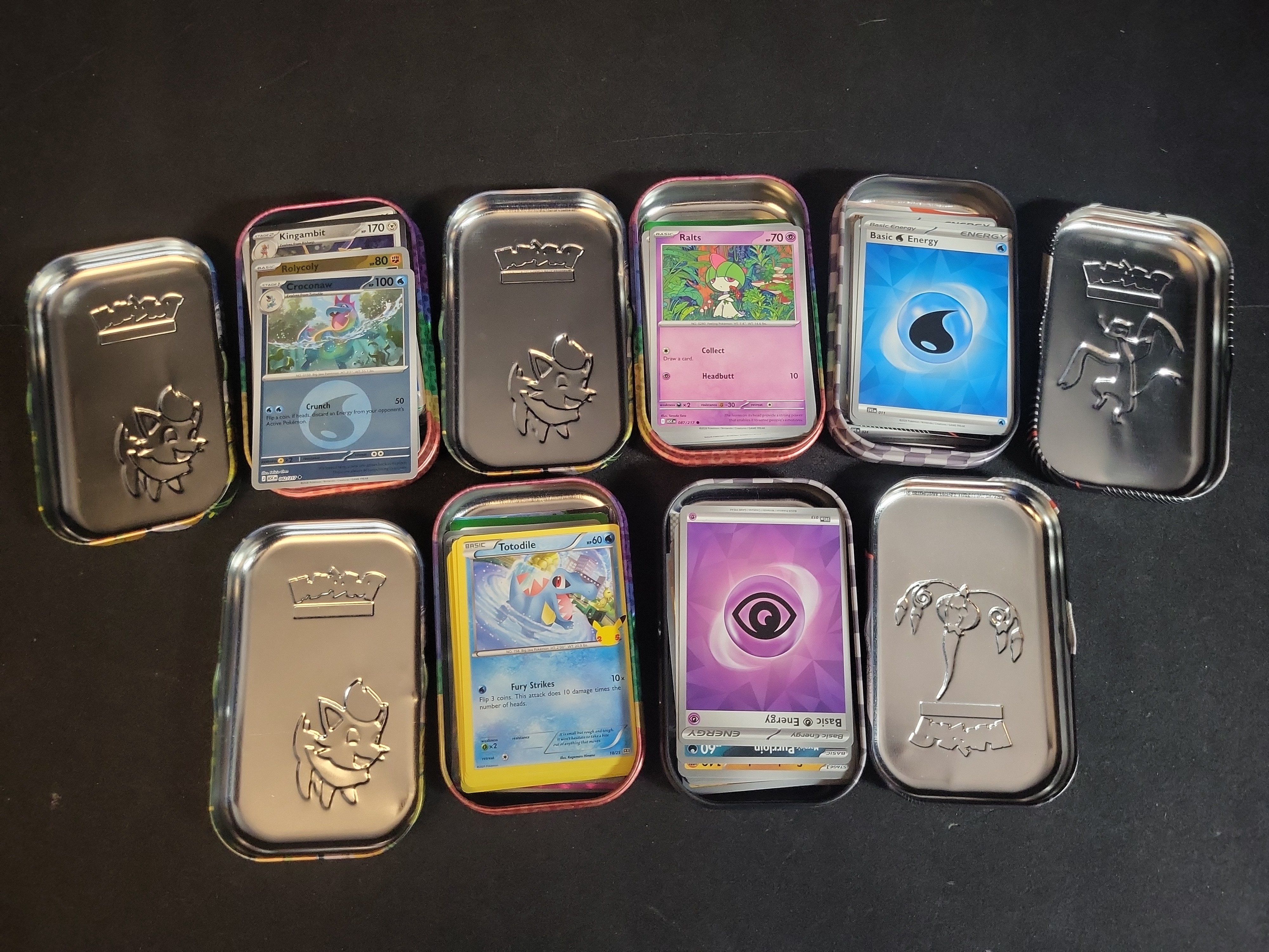 I02746 | A Collection of Pokemon TCG Cards and Unova Series Mini Tins