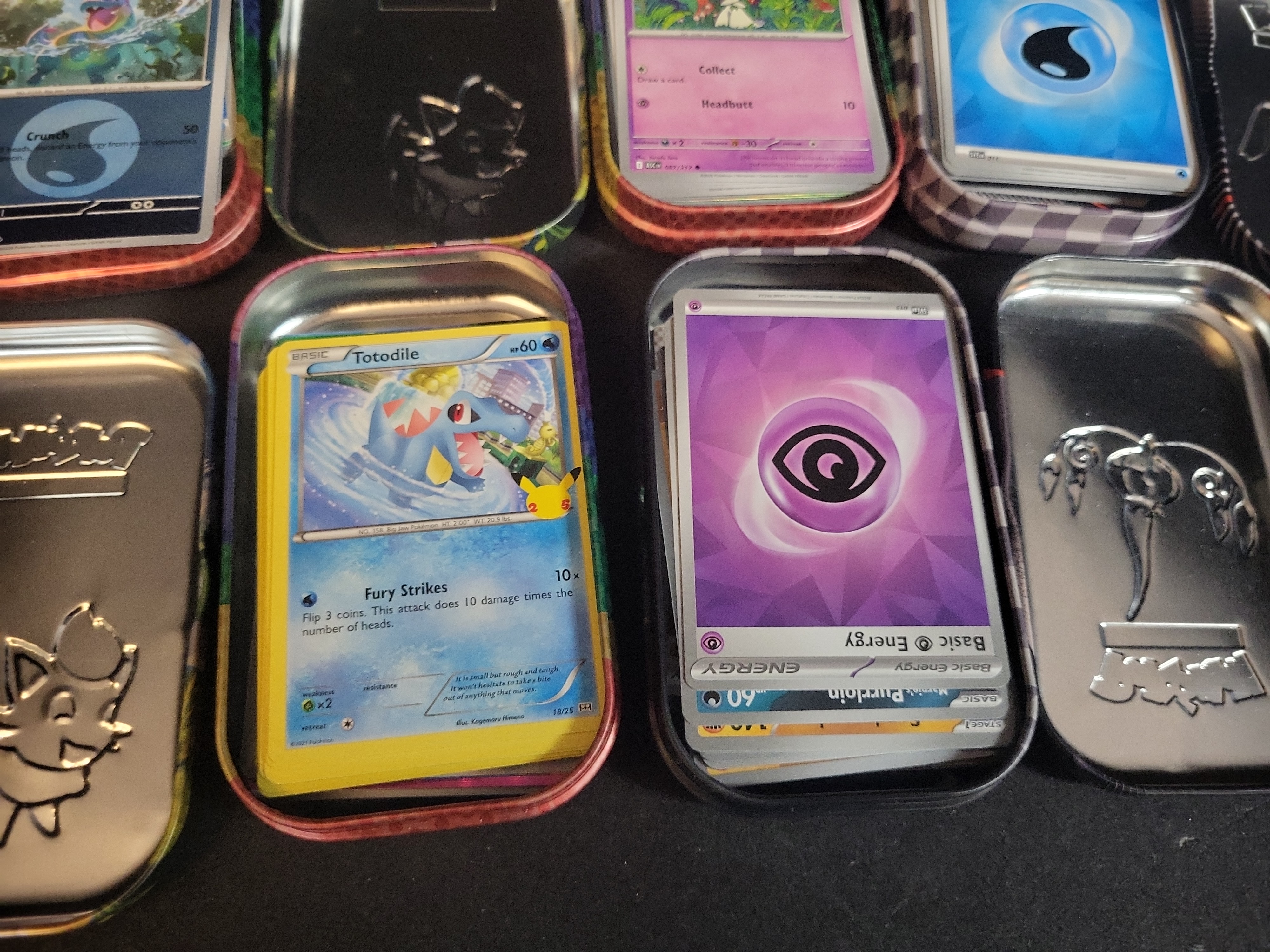 I02746 | A Collection of Pokemon TCG Cards and Unova Series Mini Tins