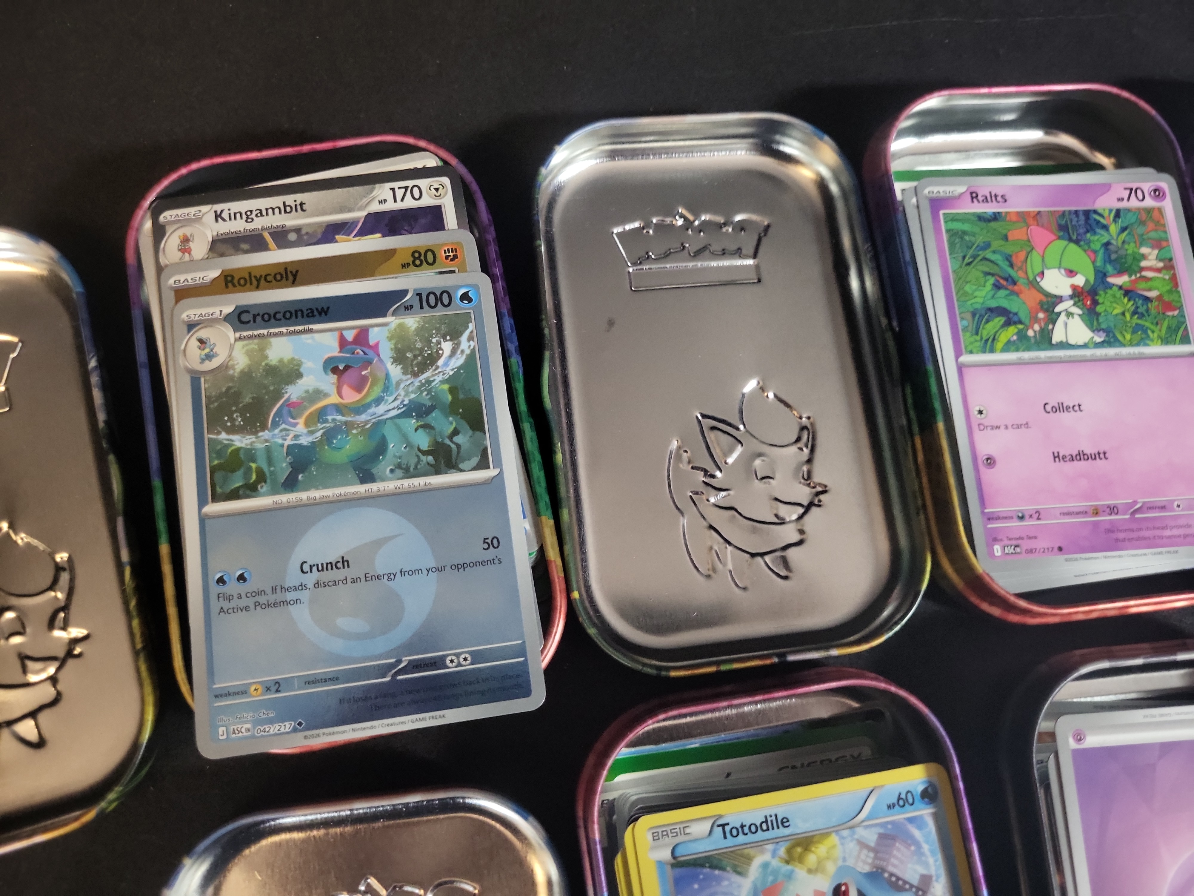 I02746 | A Collection of Pokemon TCG Cards and Unova Series Mini Tins