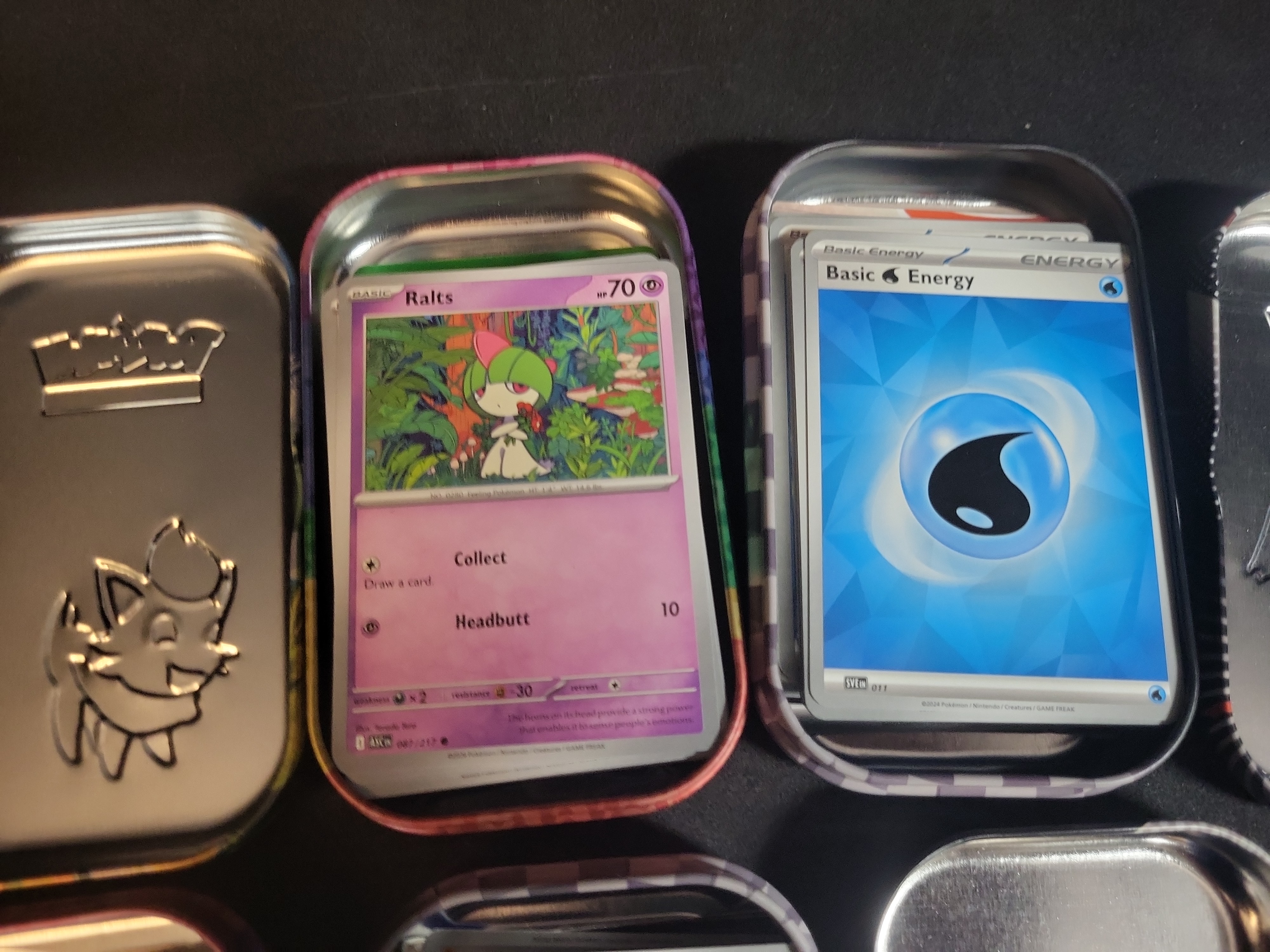 I02746 | A Collection of Pokemon TCG Cards and Unova Series Mini Tins