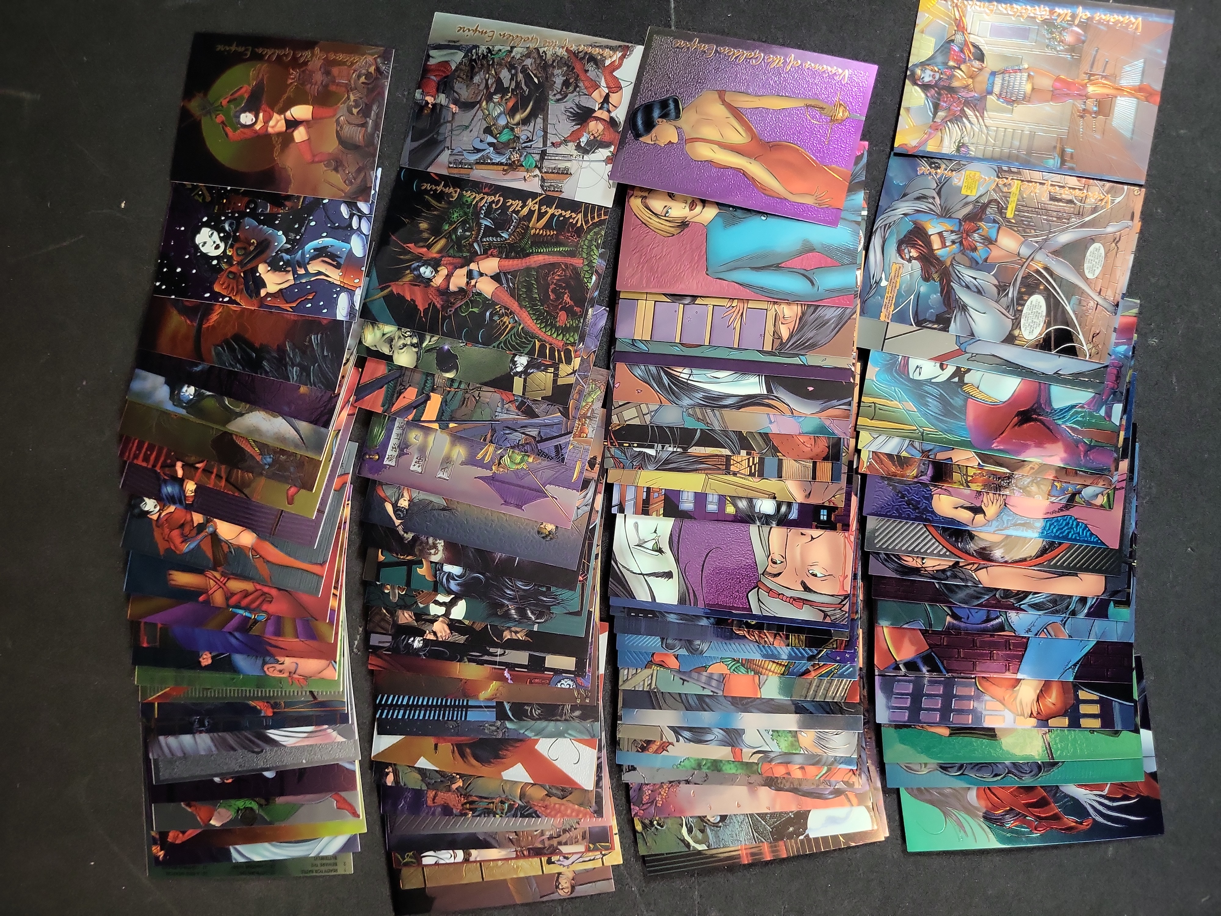 I03937 | A Collection of 1996 Shi Visions of the Golden Empire Chromium Trading Cards by Comic Images