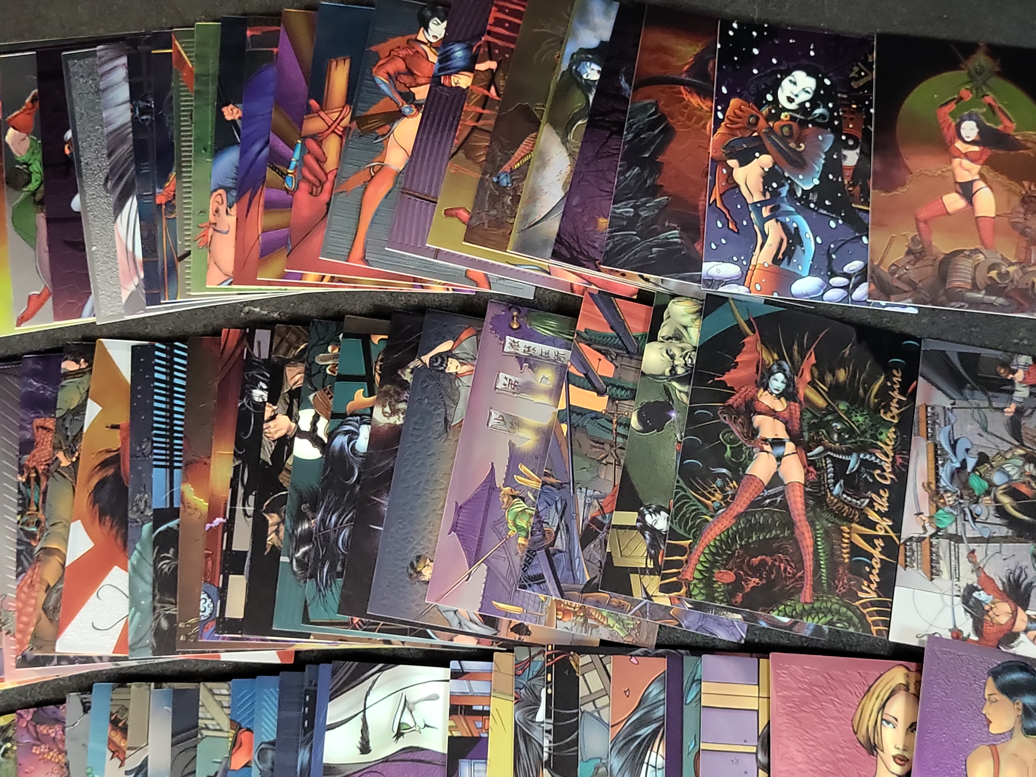 I03937 | A Collection of 1996 Shi Visions of the Golden Empire Chromium Trading Cards by Comic Images