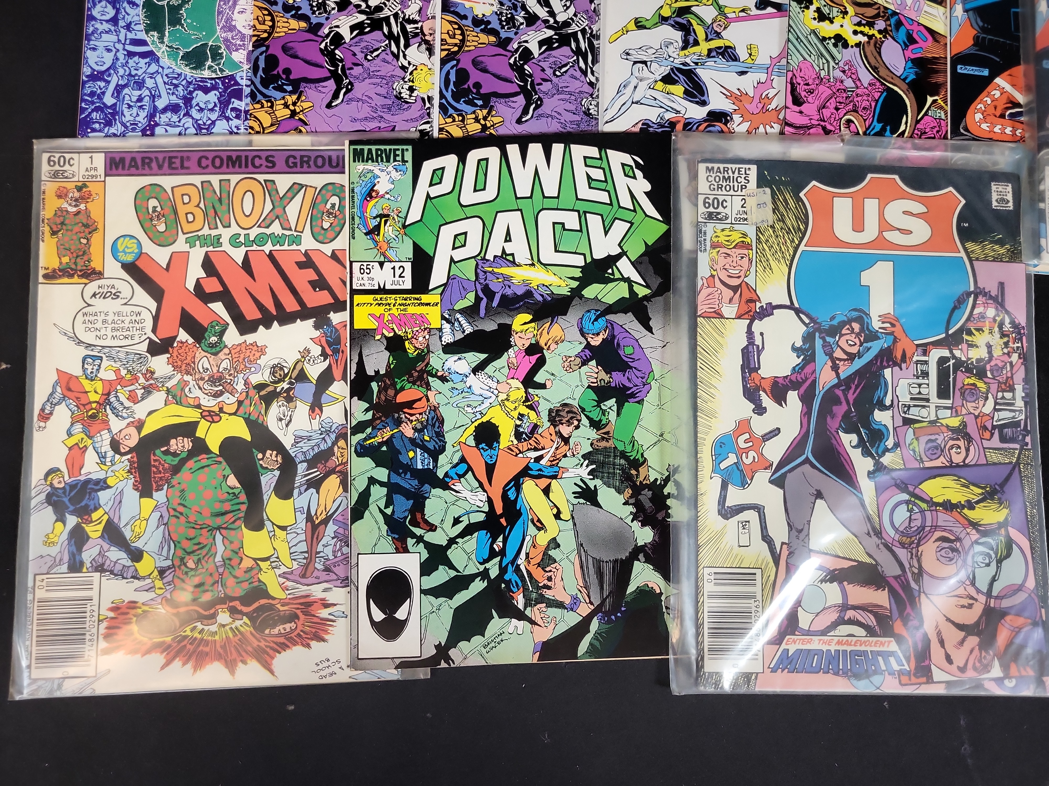 I03732 | A Collection of Approximately 45 Marvel and DC Comic Books Including X-Factor #1 and Captain Universe Key Issues