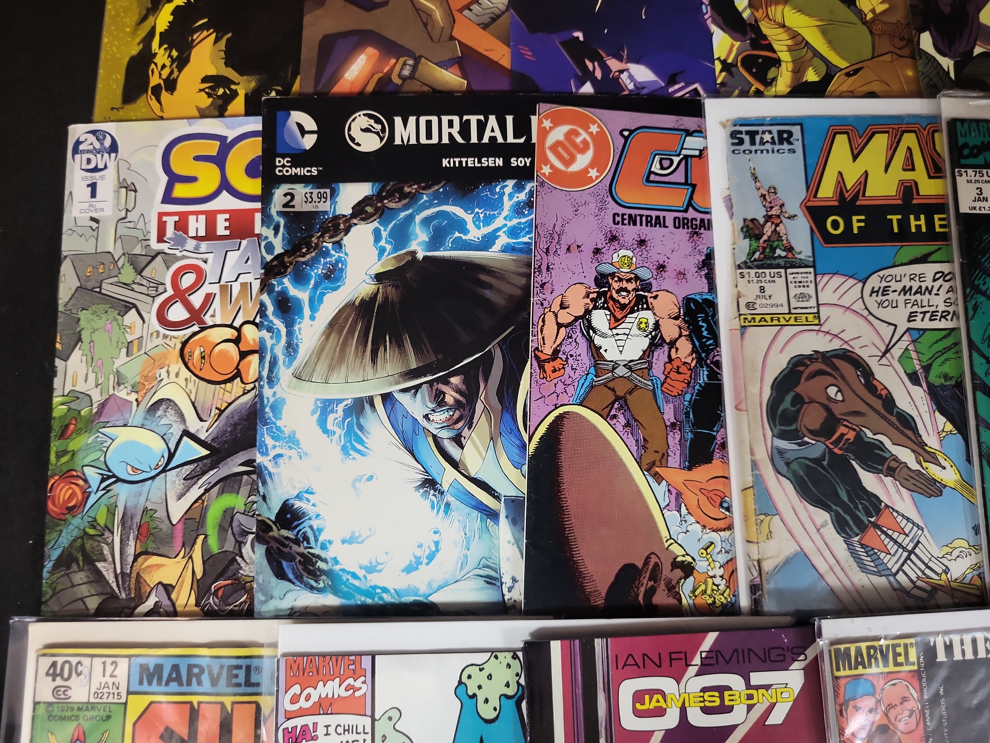 I03620 | A Collection of Bronze, Copper, and Modern Age Comic Books Featuring The Walking Dead, Transformers, and Licensed Properties