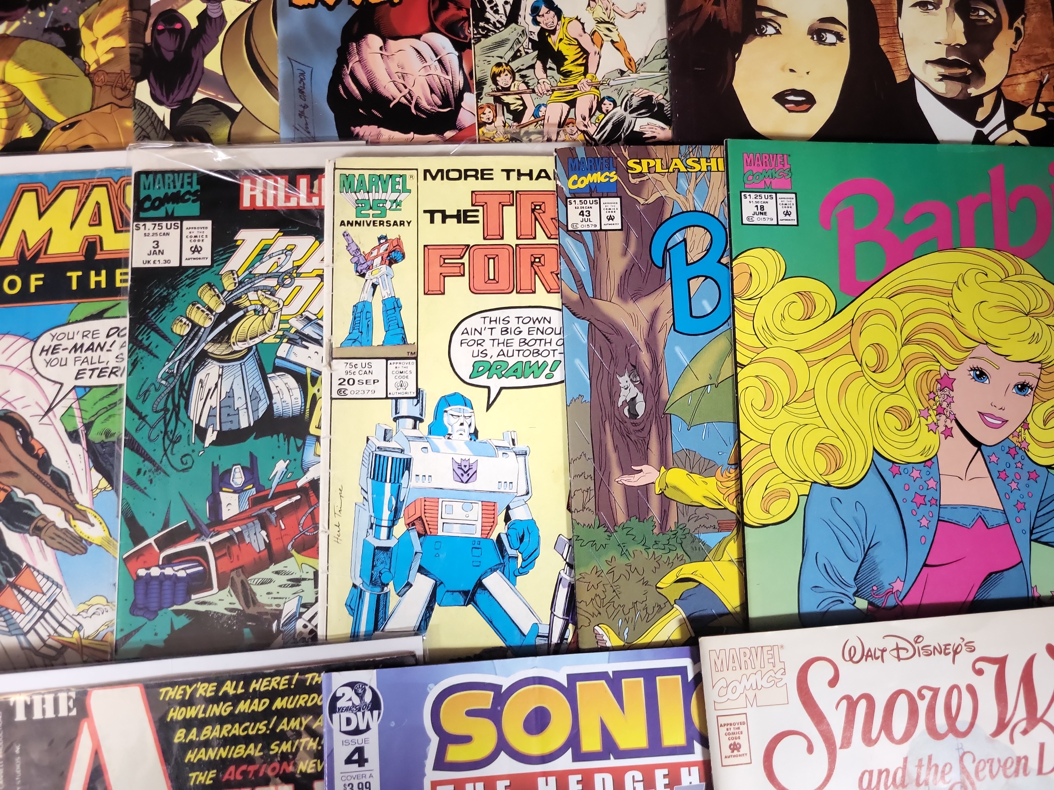 I03620 | A Collection of Bronze, Copper, and Modern Age Comic Books Featuring The Walking Dead, Transformers, and Licensed Properties