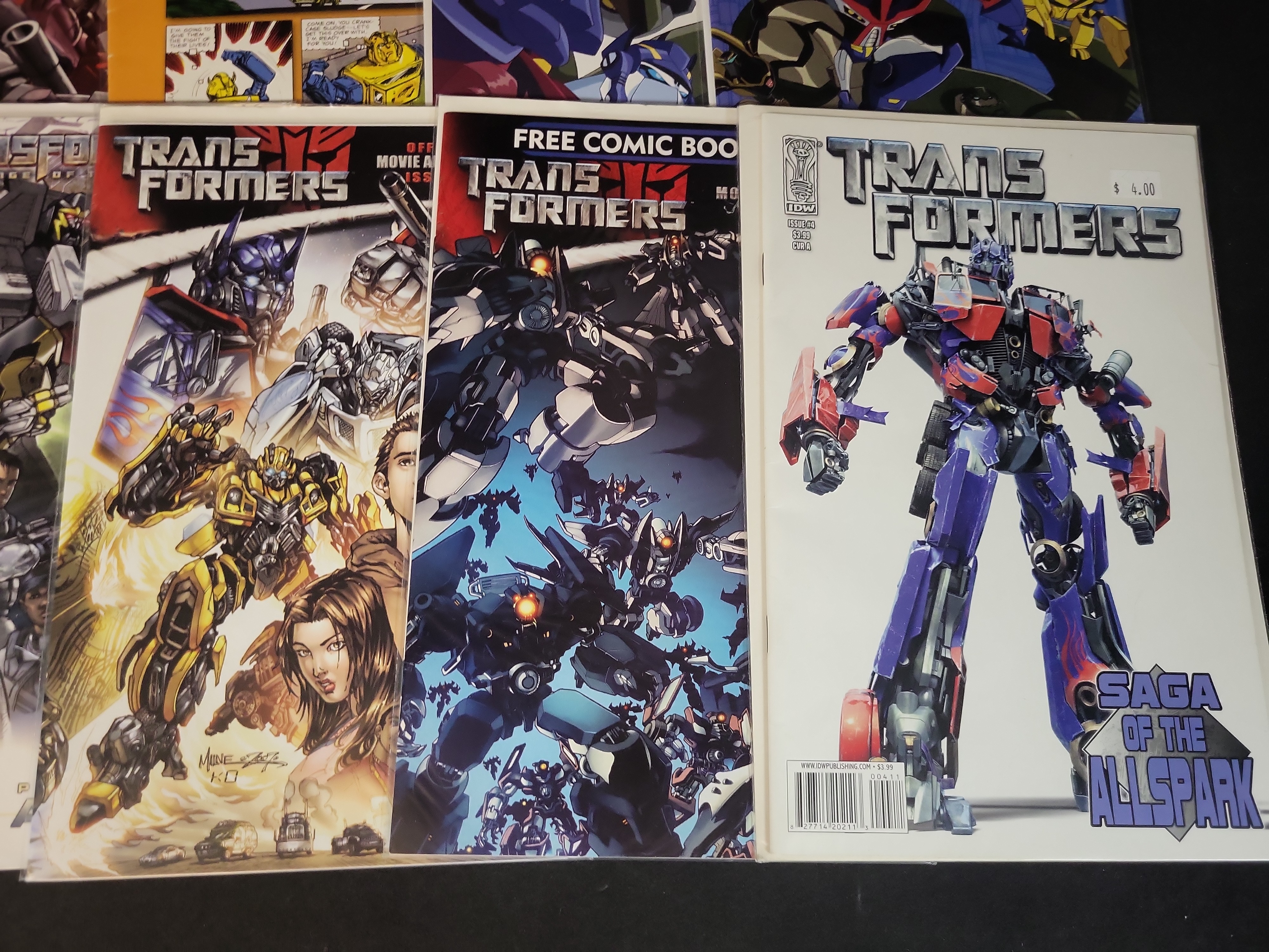 I03785 | A Collection of IDW Publishing Transformers Comic Books including All Hail Megatron and Movie Tie-ins