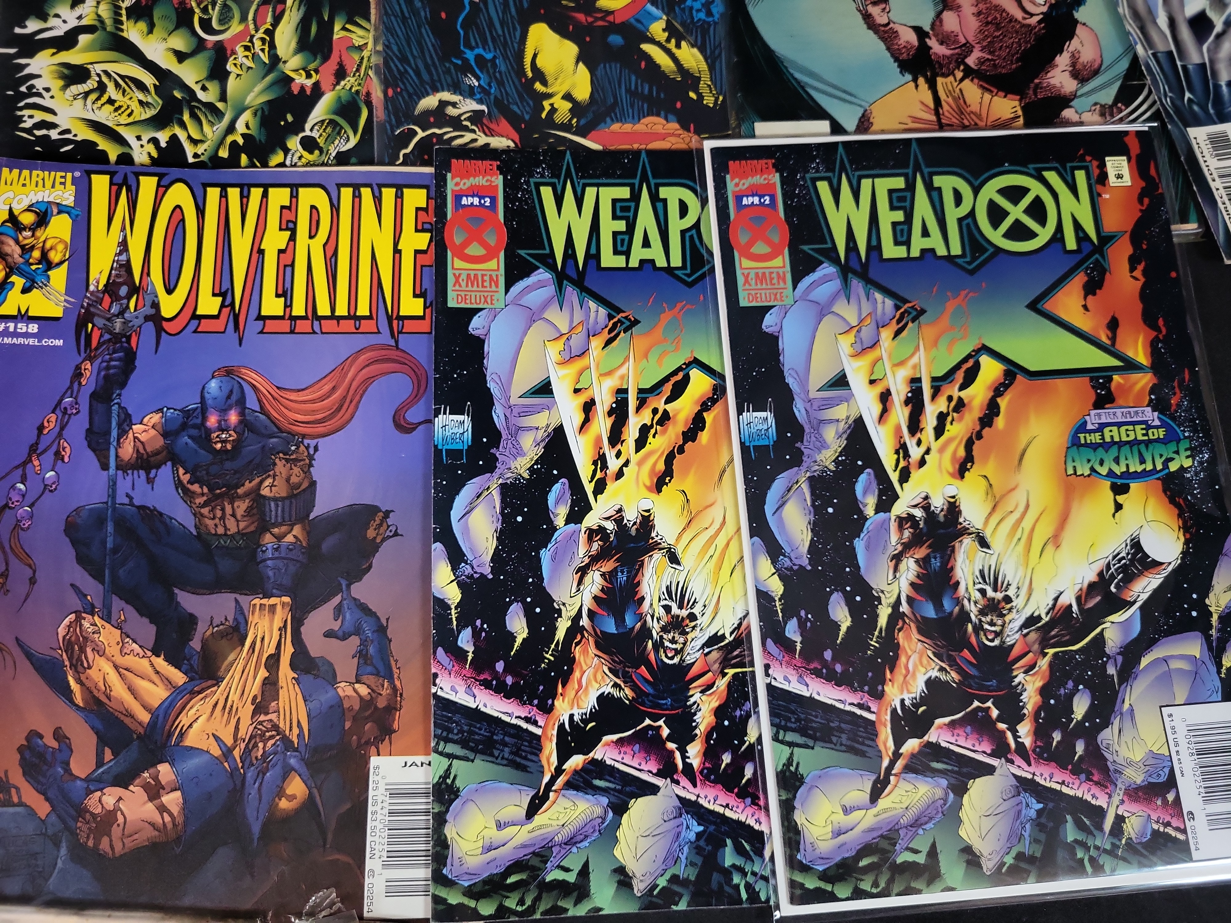 I03692 | Nine Marvel Comic Books Featuring Wolverine and Weapon X
