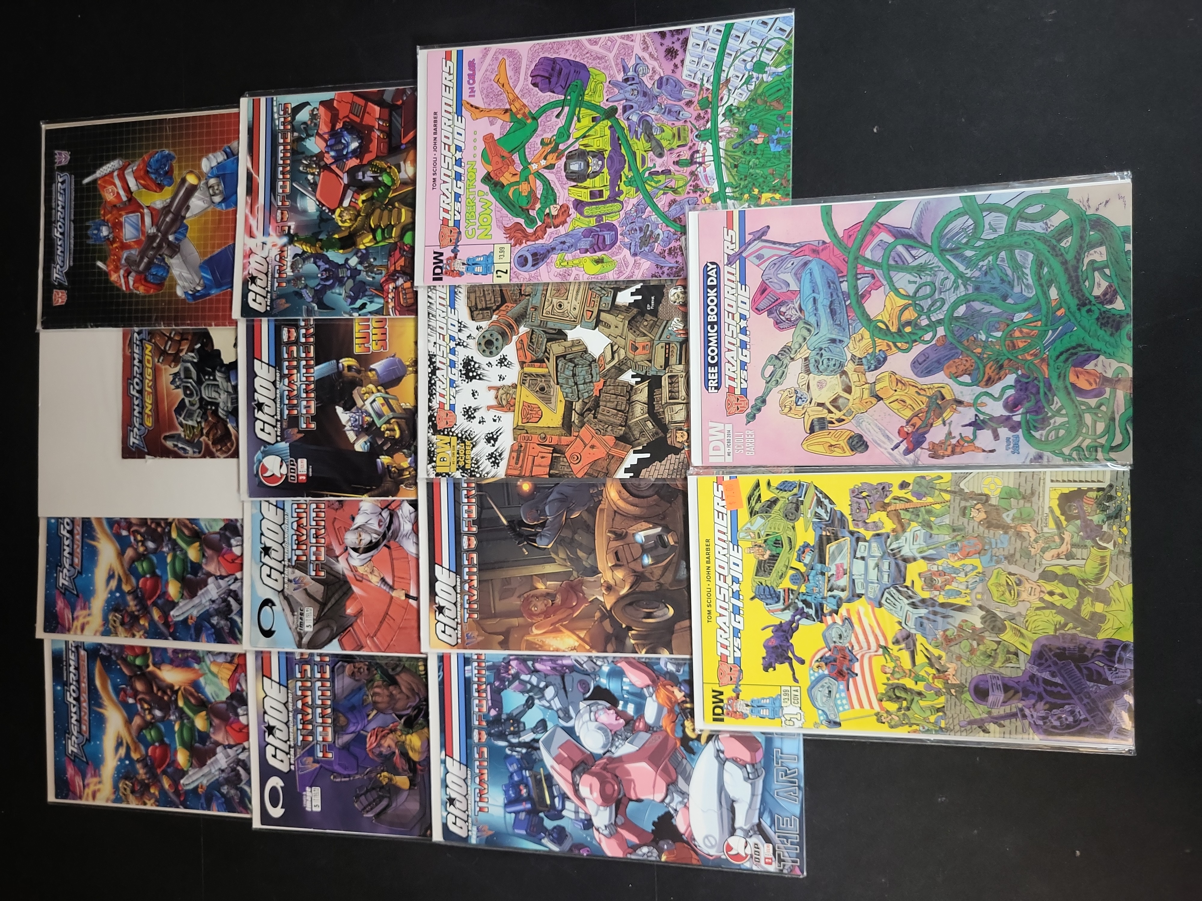 I03783 | A Collection of Transformers and G.I. Joe Crossover Comic Books and Convention Ephemera