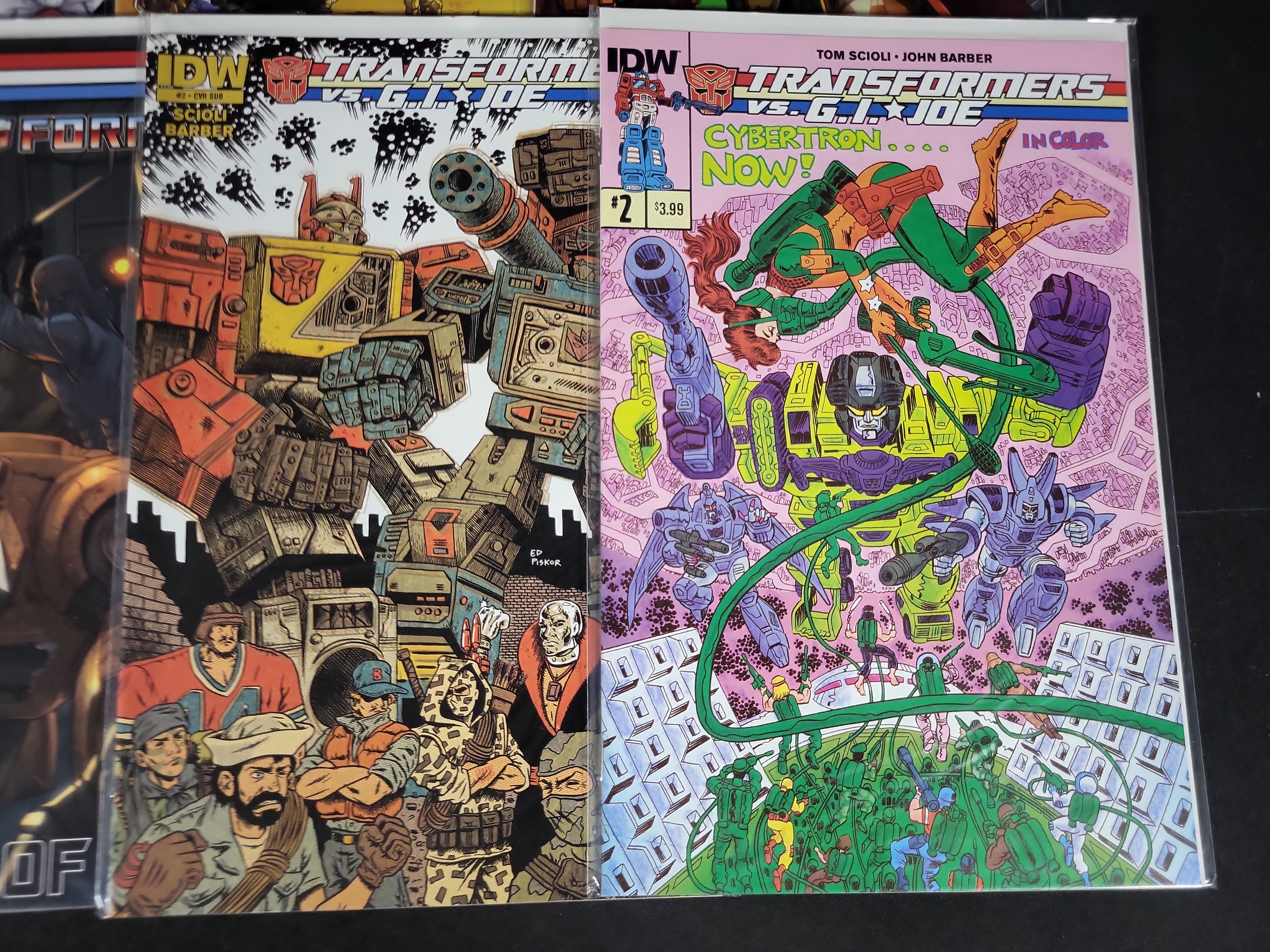 I03783 | A Collection of Transformers and G.I. Joe Crossover Comic Books and Convention Ephemera