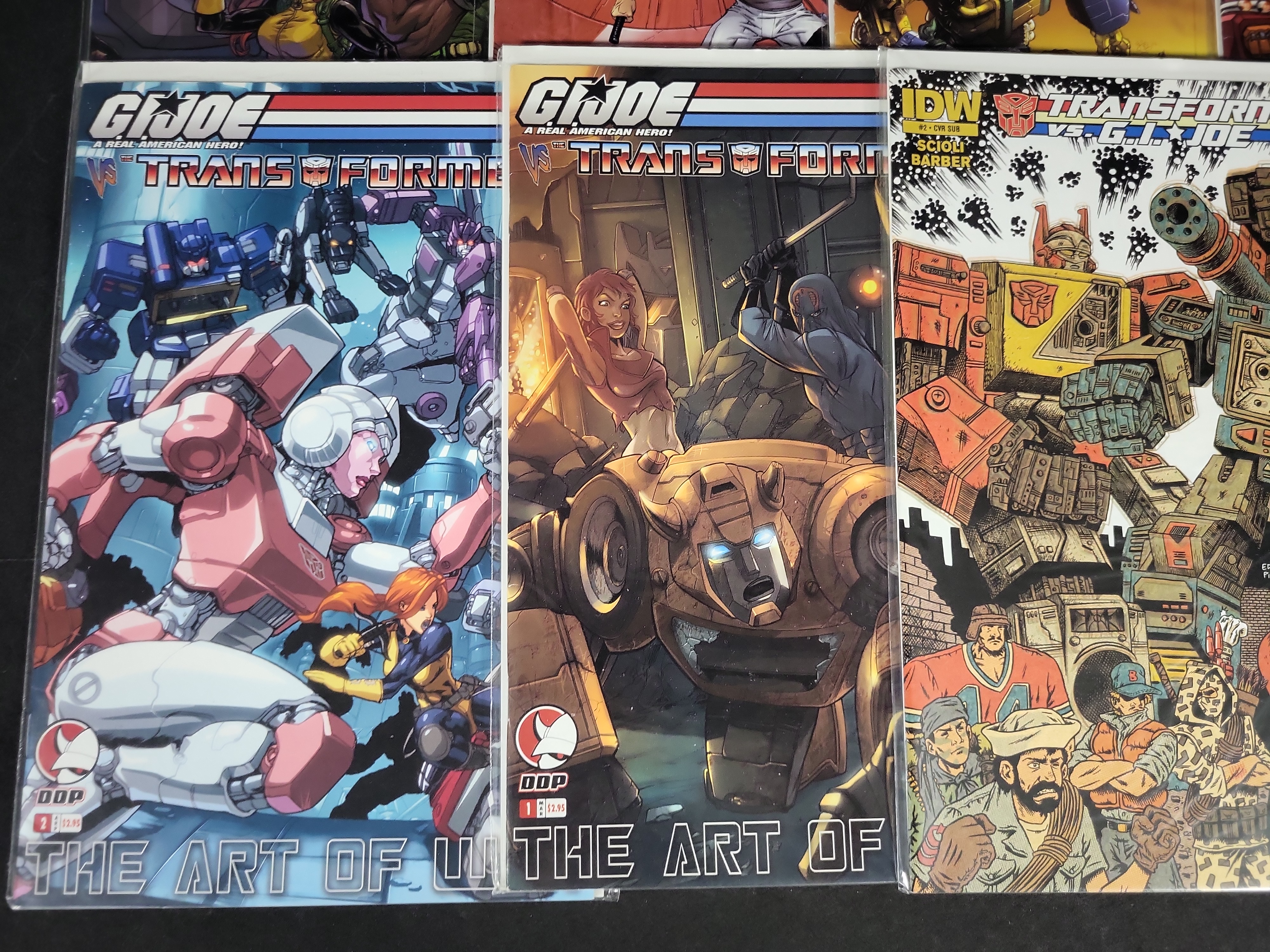 I03783 | A Collection of Transformers and G.I. Joe Crossover Comic Books and Convention Ephemera