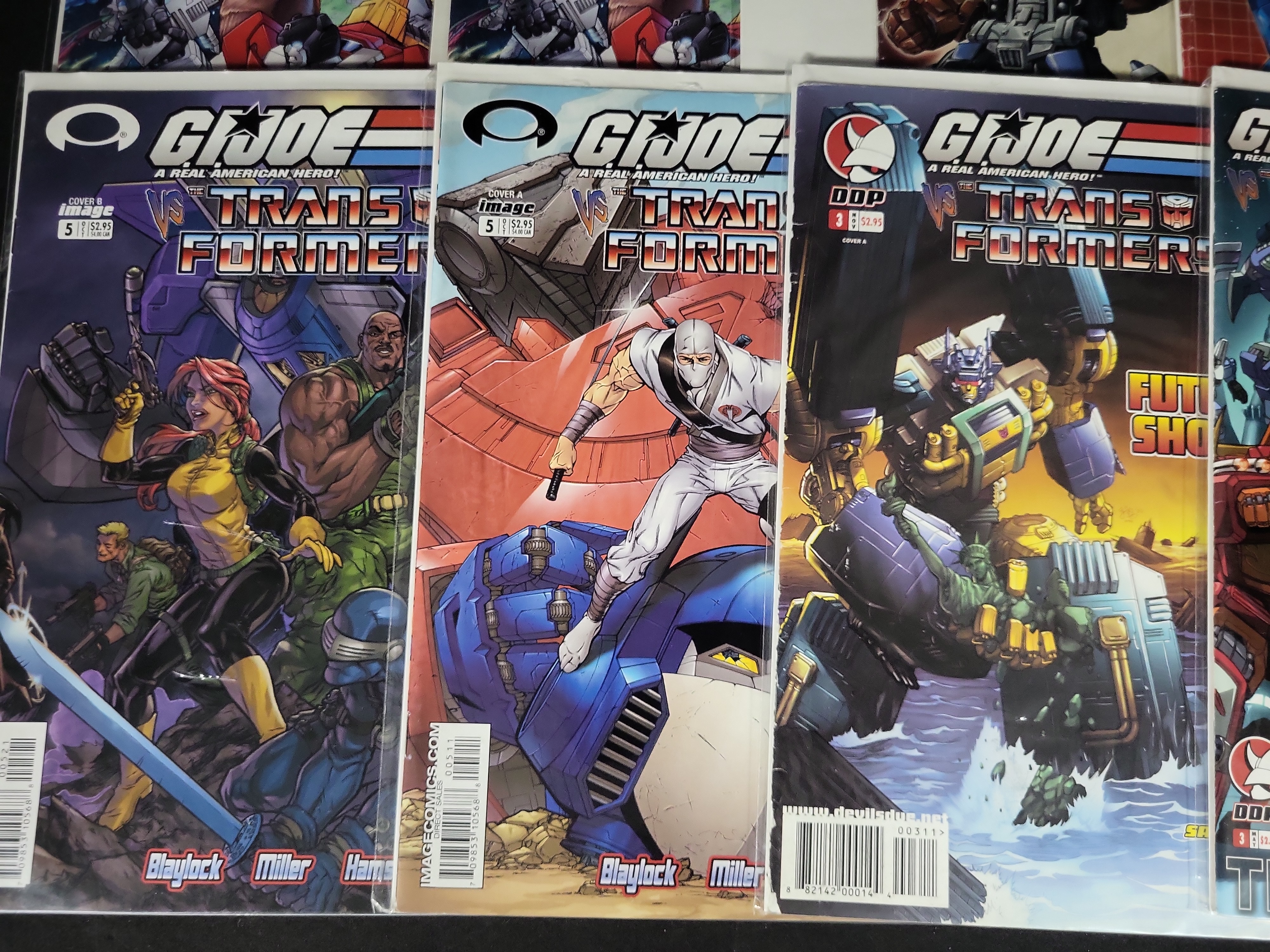 I03783 | A Collection of Transformers and G.I. Joe Crossover Comic Books and Convention Ephemera