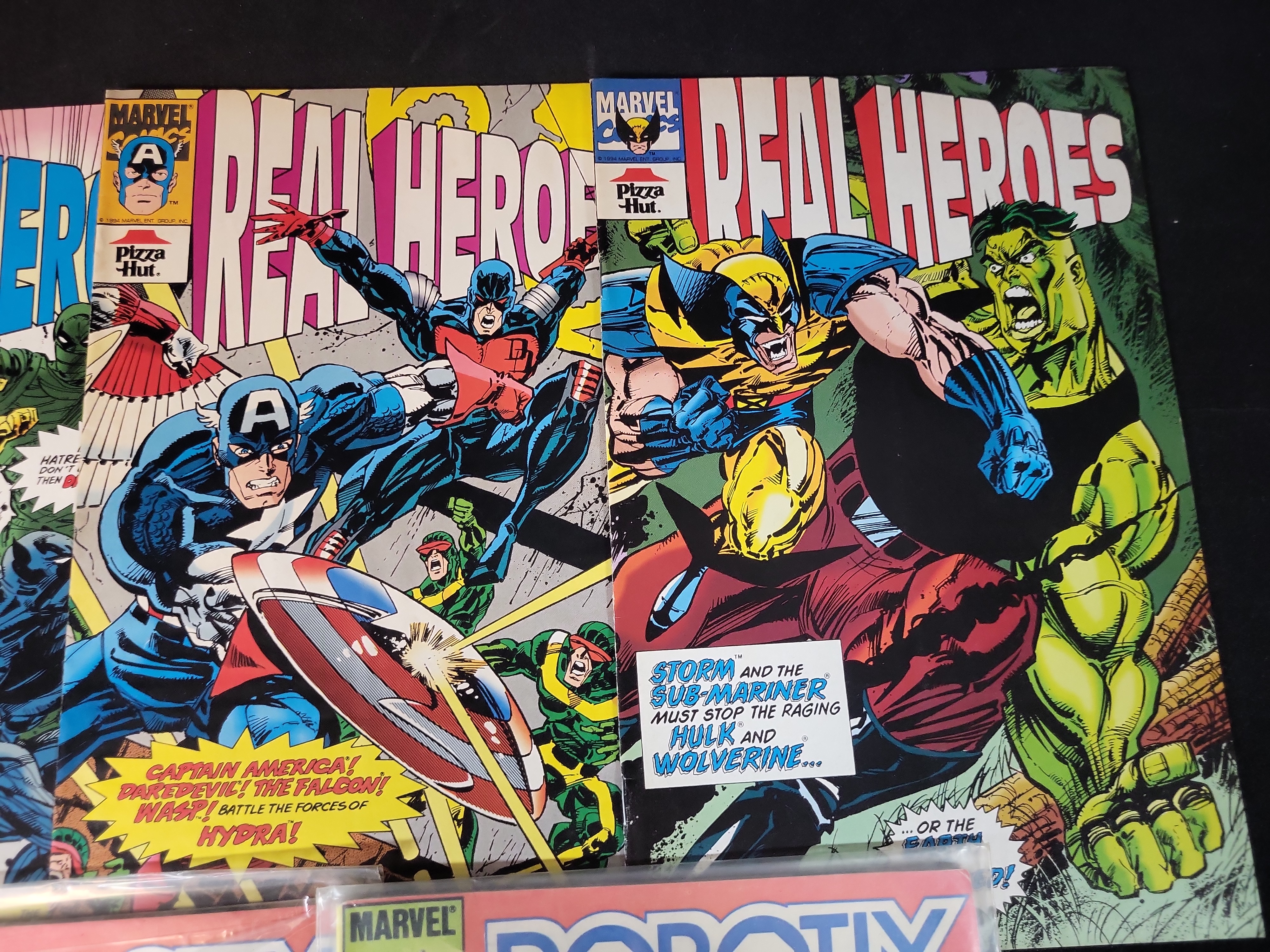 I03740 | A Group of Marvel Comic Books including Pizza Hut Promotional Issues and Robotix Issue 1