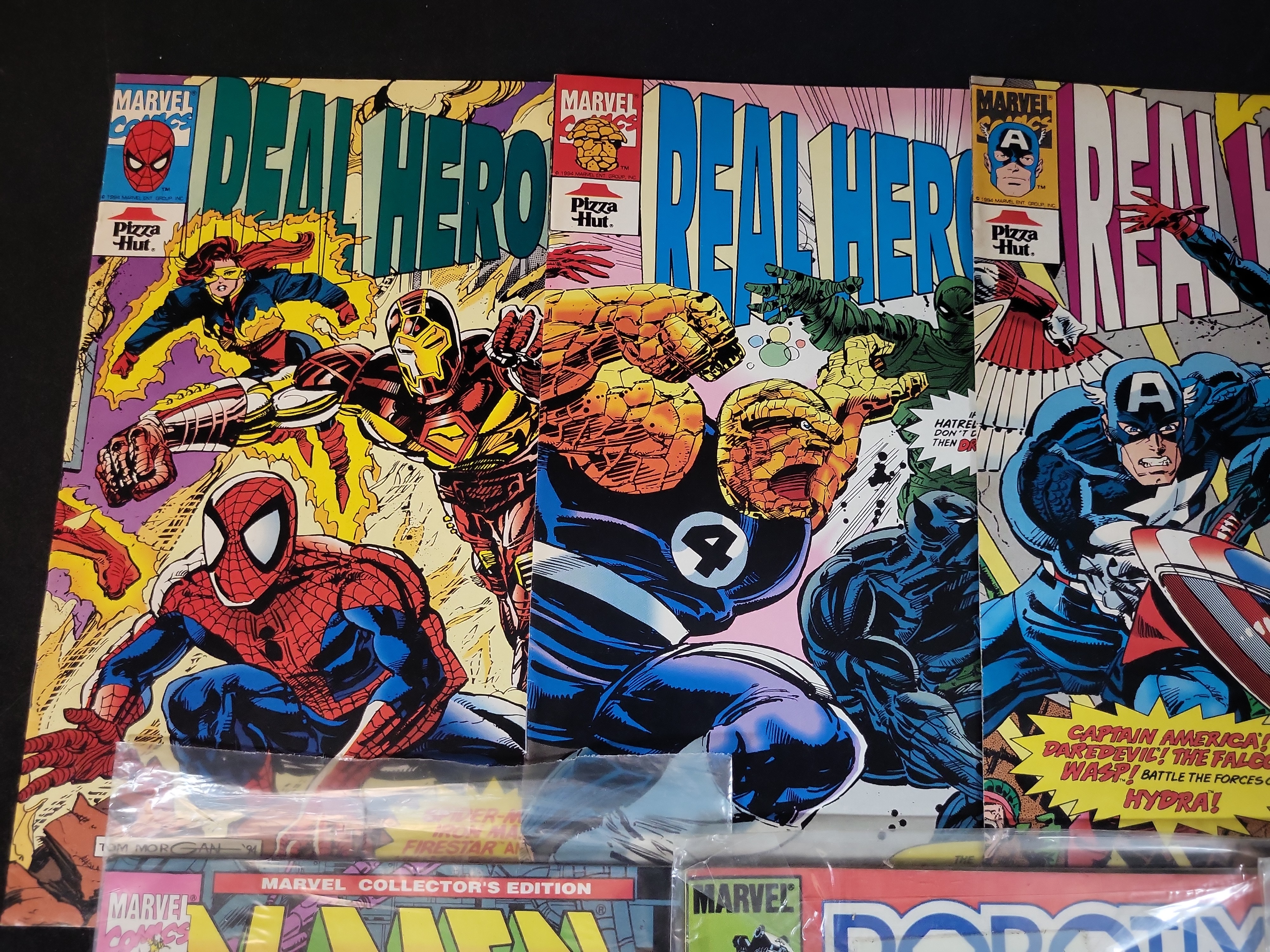 I03740 | A Group of Marvel Comic Books including Pizza Hut Promotional Issues and Robotix Issue 1