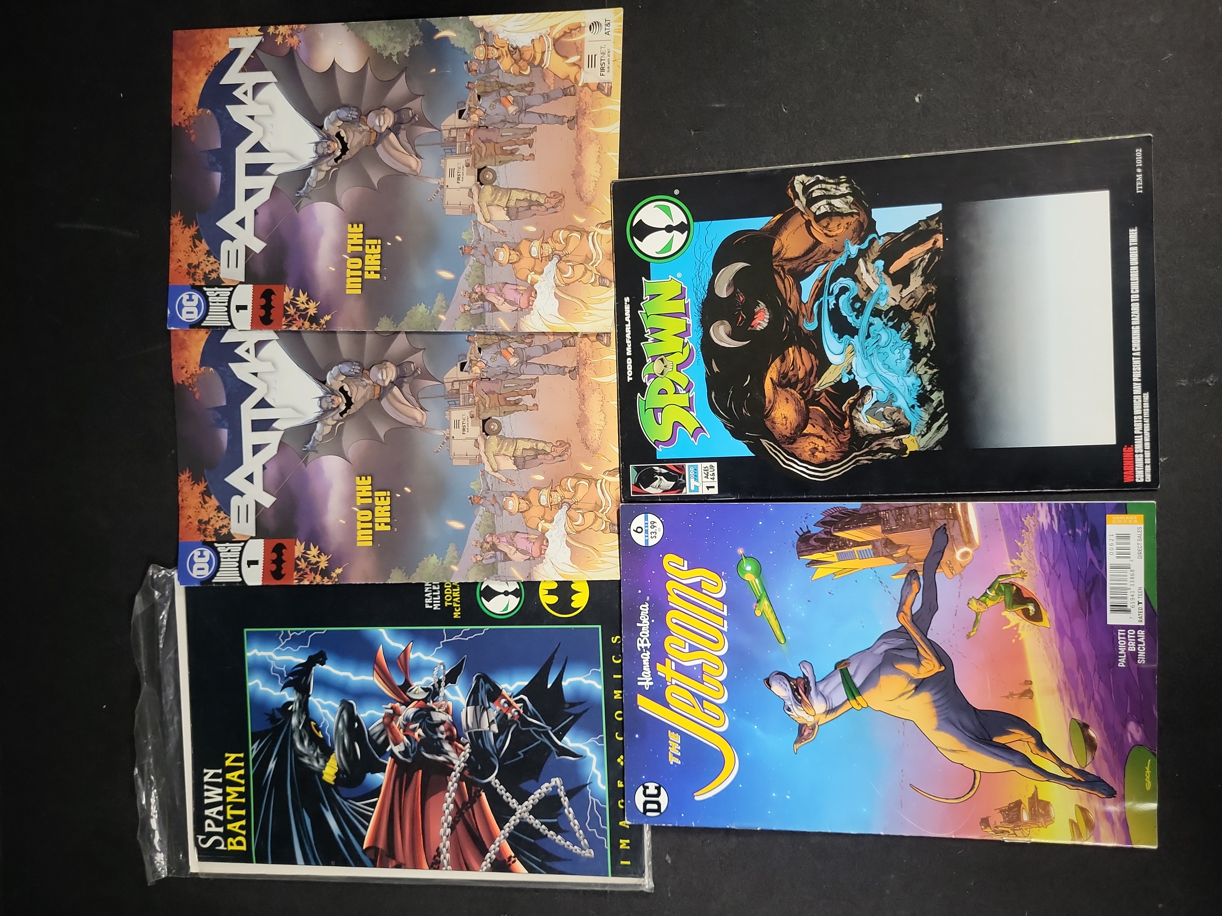 I03846 | A Collection of Five Comic Books Including Spawn/Batman and Batman Promotional Issues